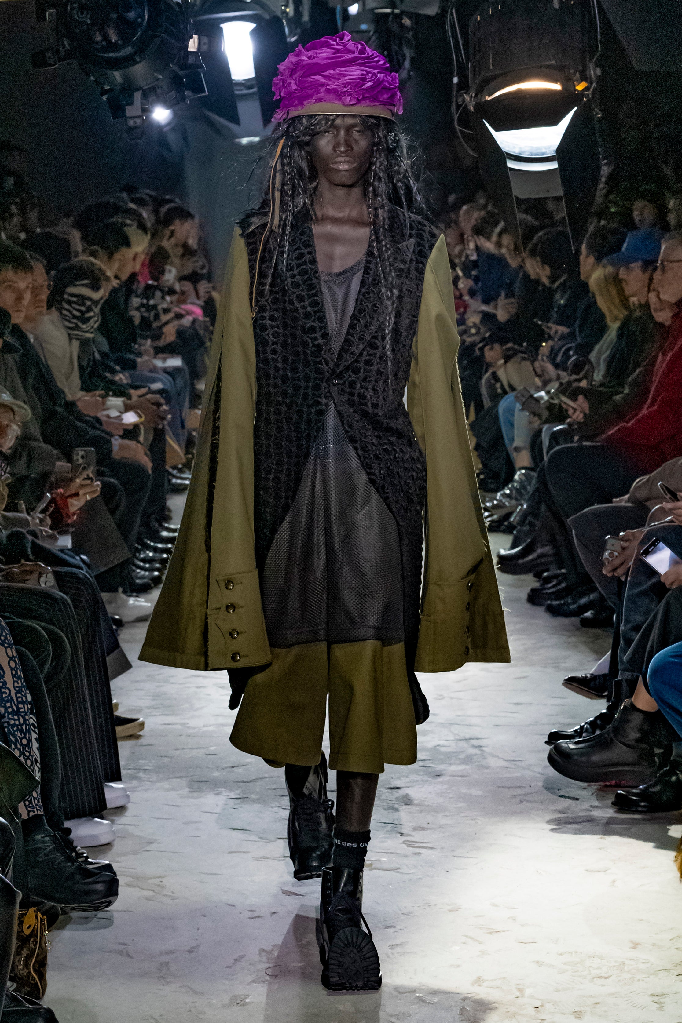 Fashion model wearing a Comme des Garçons Homme Plus AW25 outfit