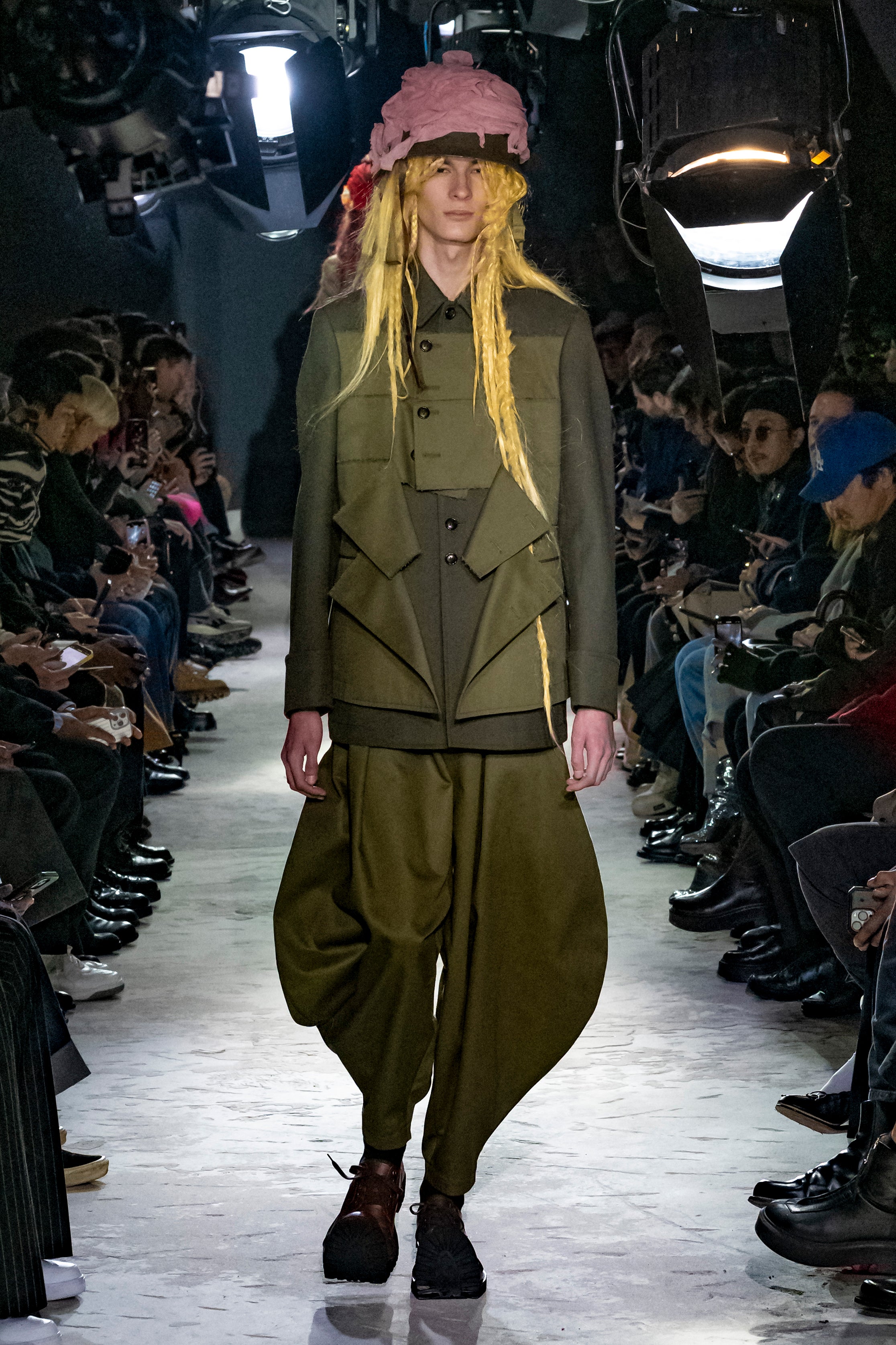 Fashion model wearing a Comme des Garçons Homme Plus AW25 outfit