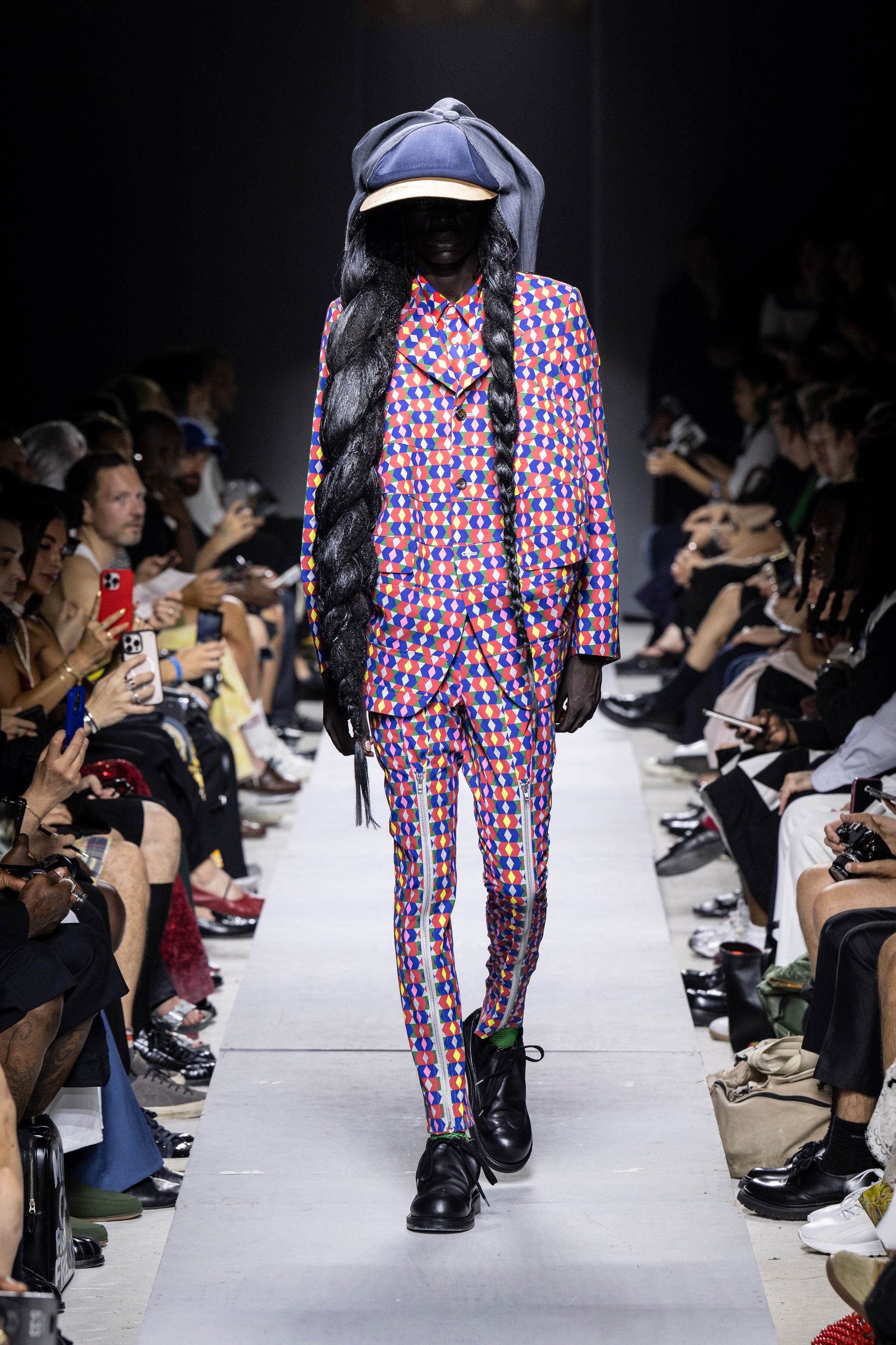 Fashion model wearing a Comme des Garçons Homme Plus SS26 outfit