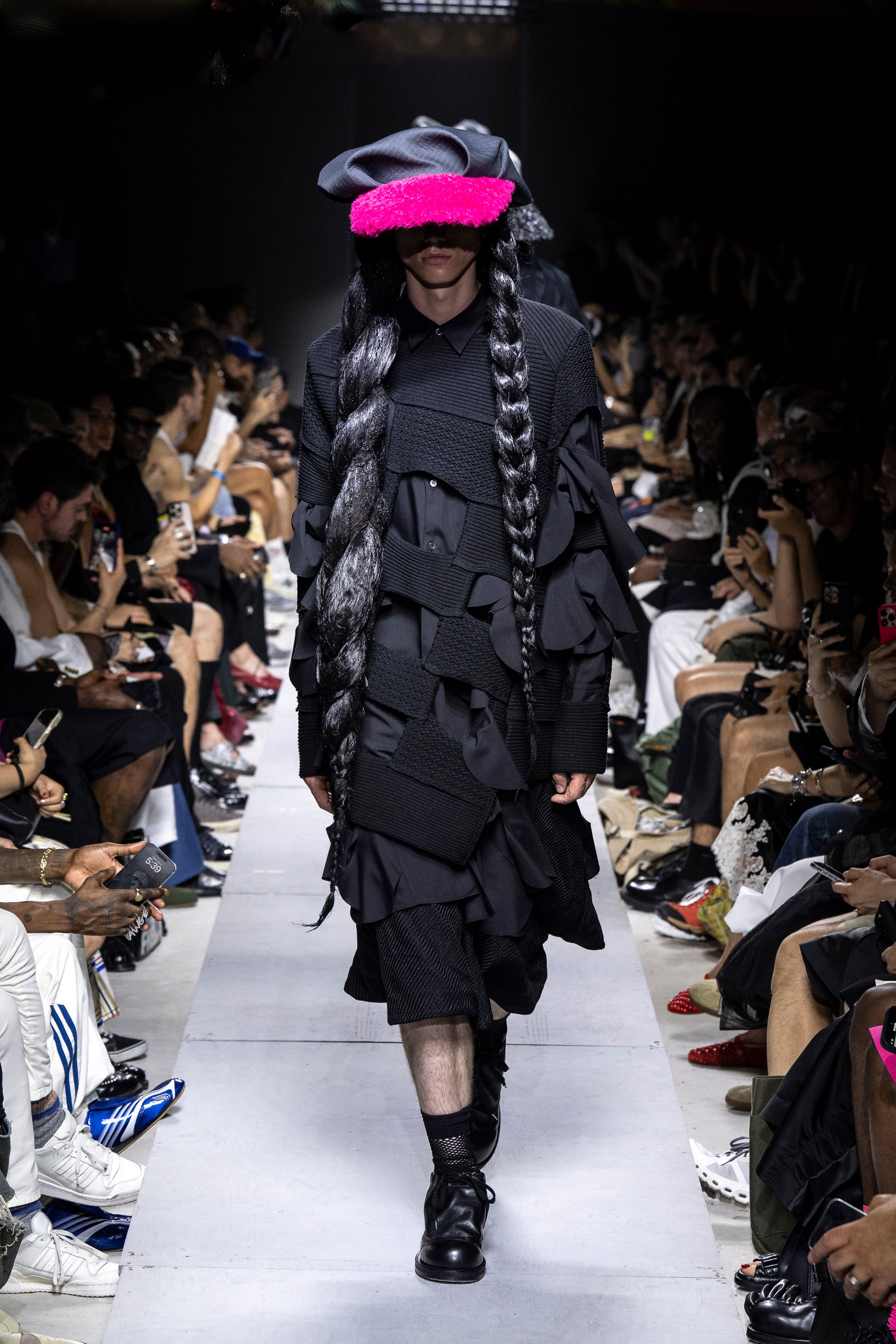 Fashion model wearing a Comme des Garçons Homme Plus SS26 outfit