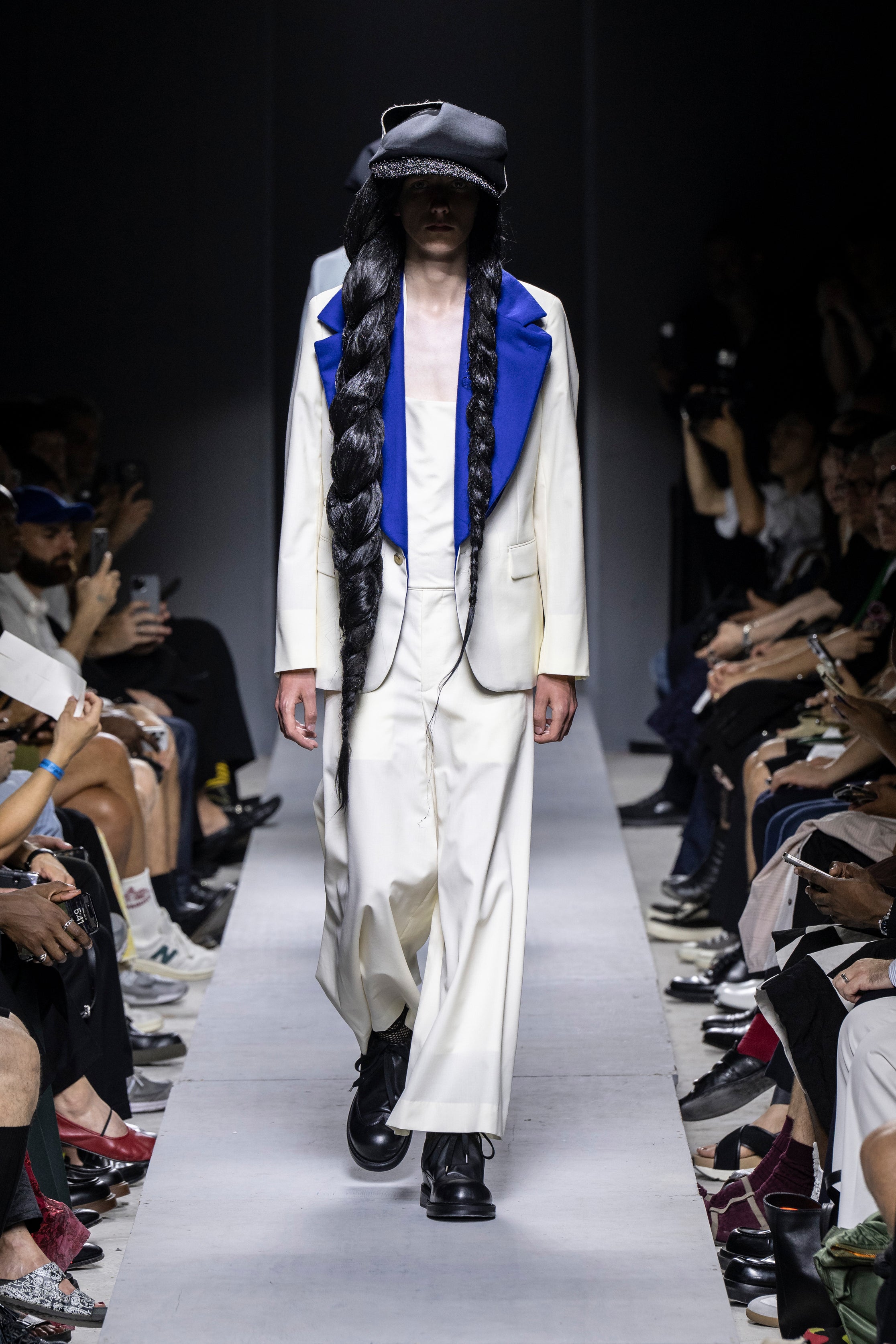 Fashion model wearing a Comme des Garçons Homme Plus SS26 outfit