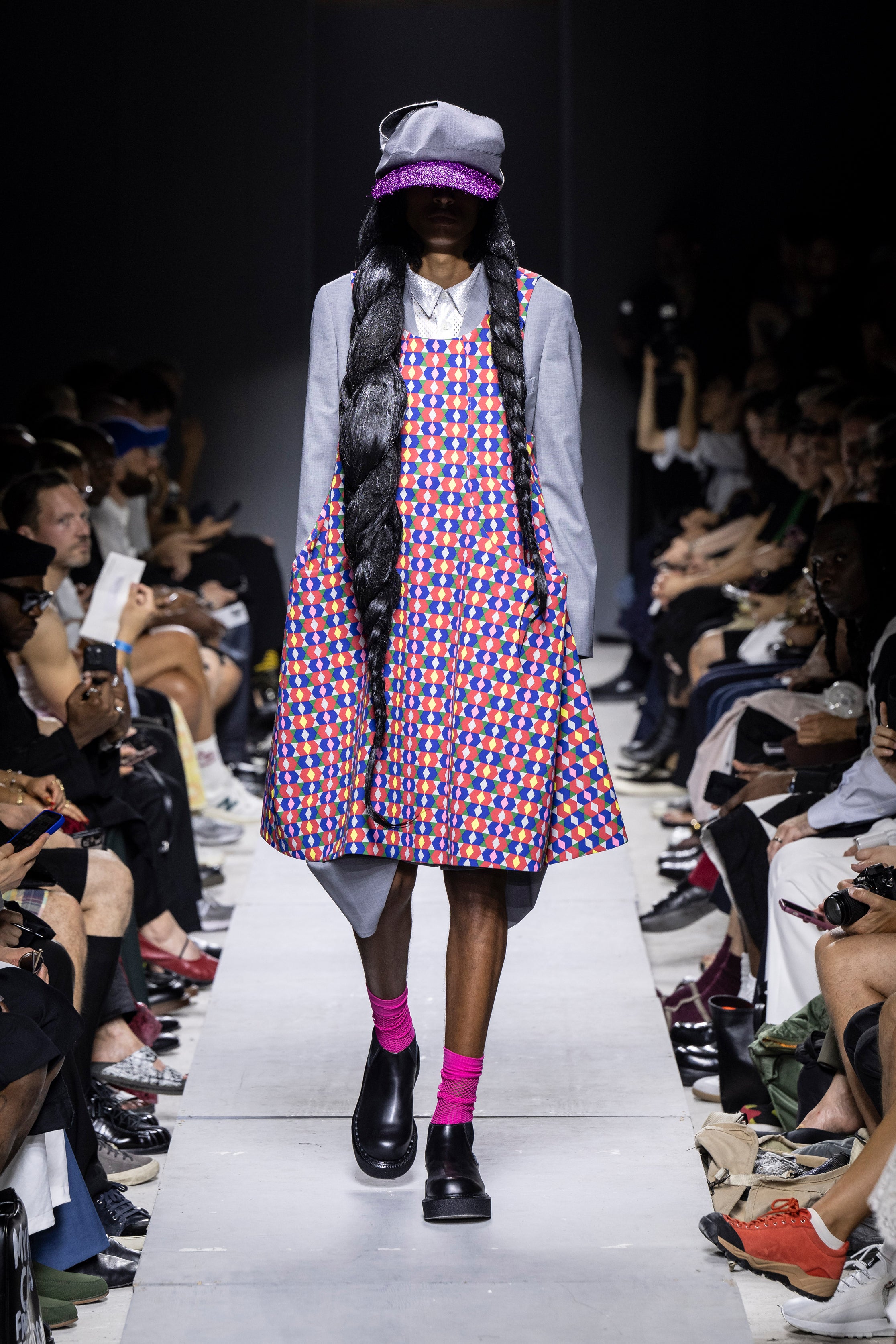 Fashion model wearing a Comme des Garçons Homme Plus SS26 outfit