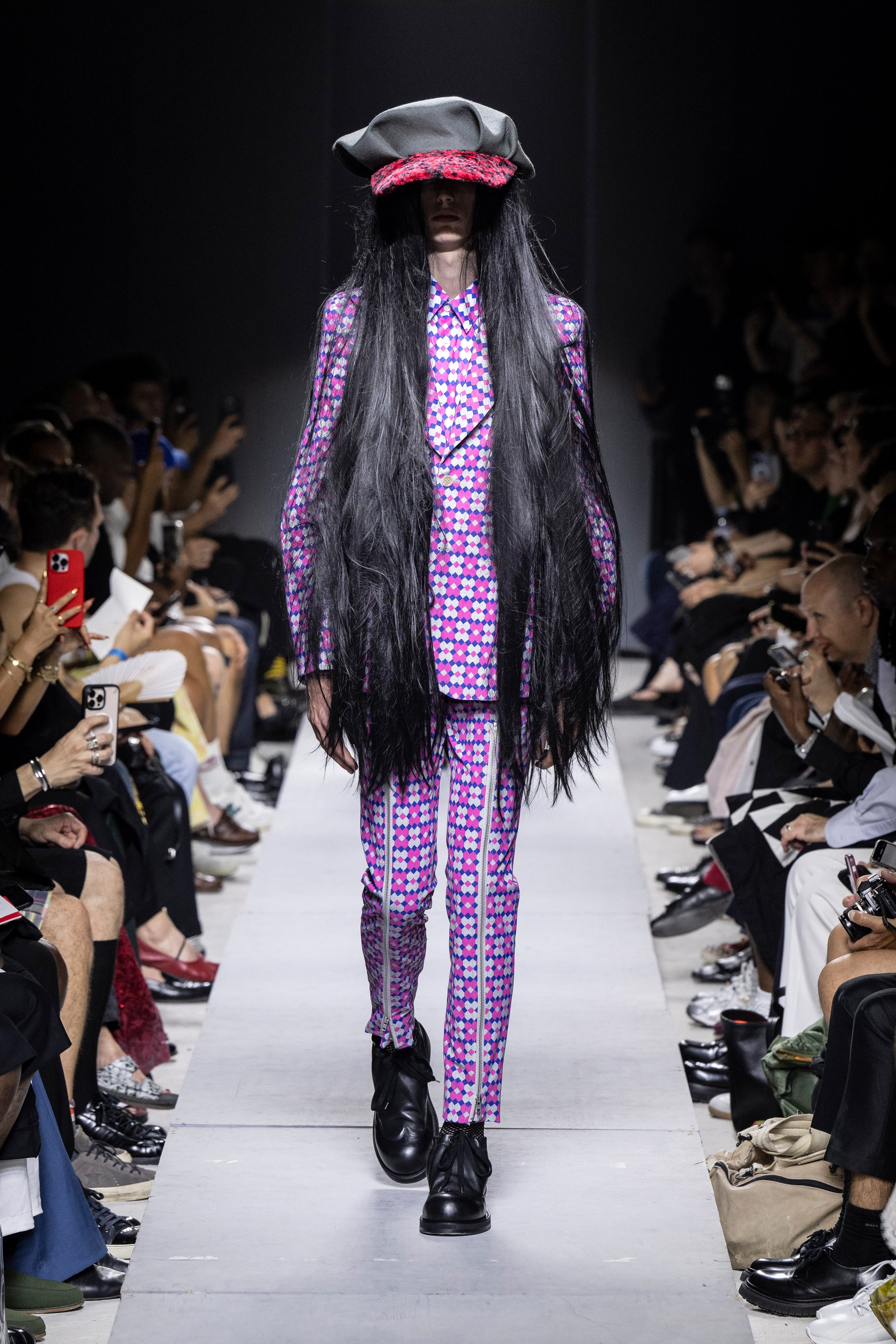 Fashion model wearing a Comme des Garçons Homme Plus SS26 outfit