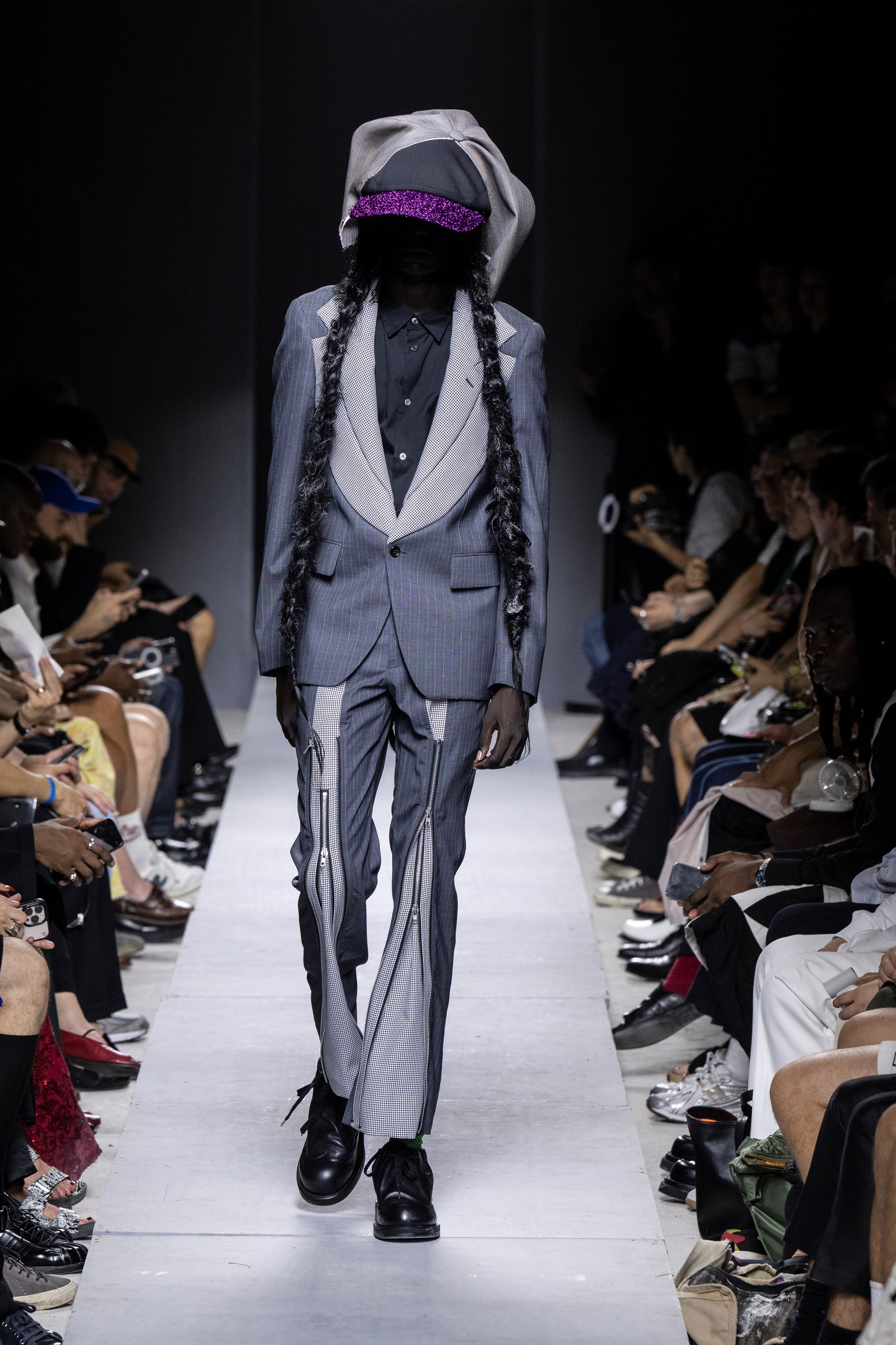 Fashion model wearing a Comme des Garçons Homme Plus SS26 outfit