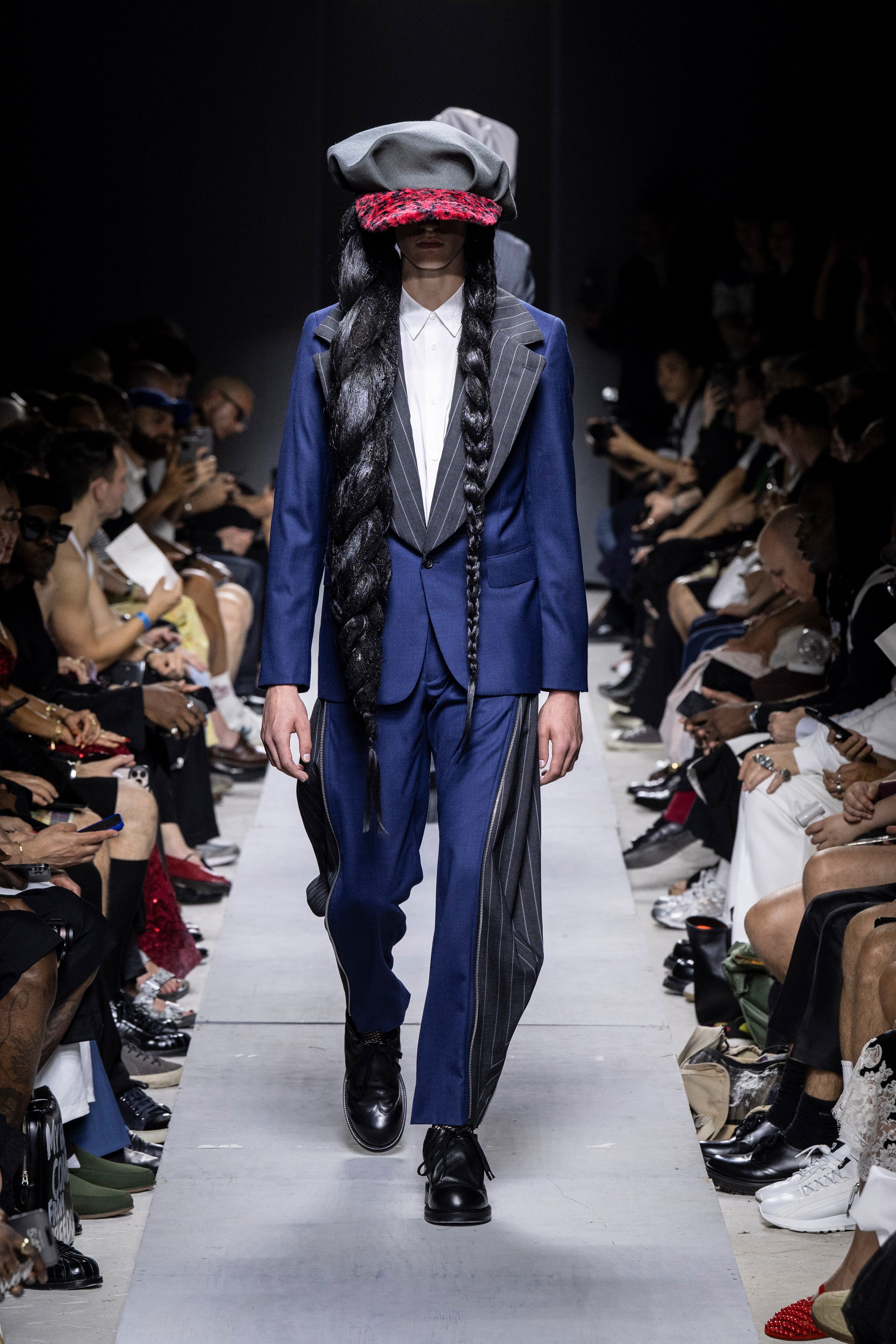 Fashion model wearing a Comme des Garçons Homme Plus SS26 outfit