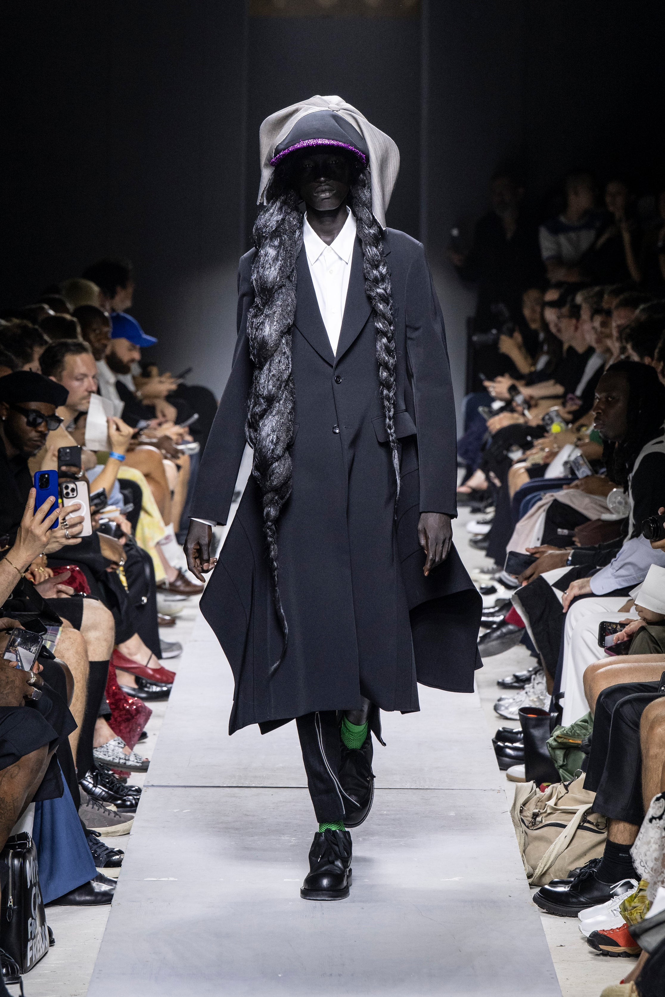 Fashion model wearing a Comme des Garçons Homme Plus SS26 outfit