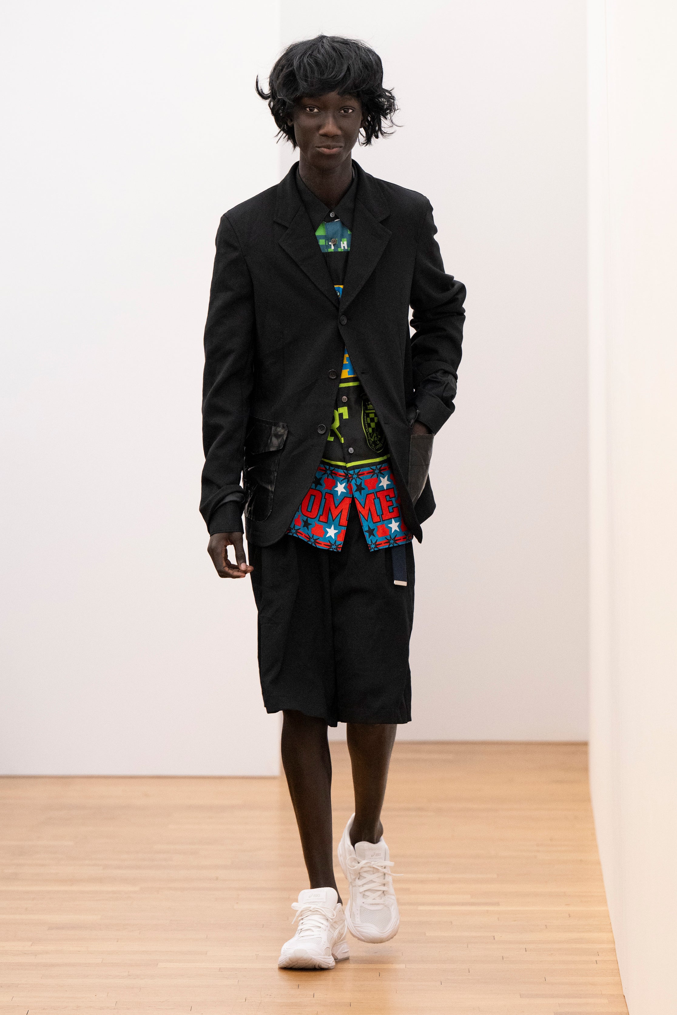 Fashion model wearing a Comme des Garçons Shirt AW25 outfit