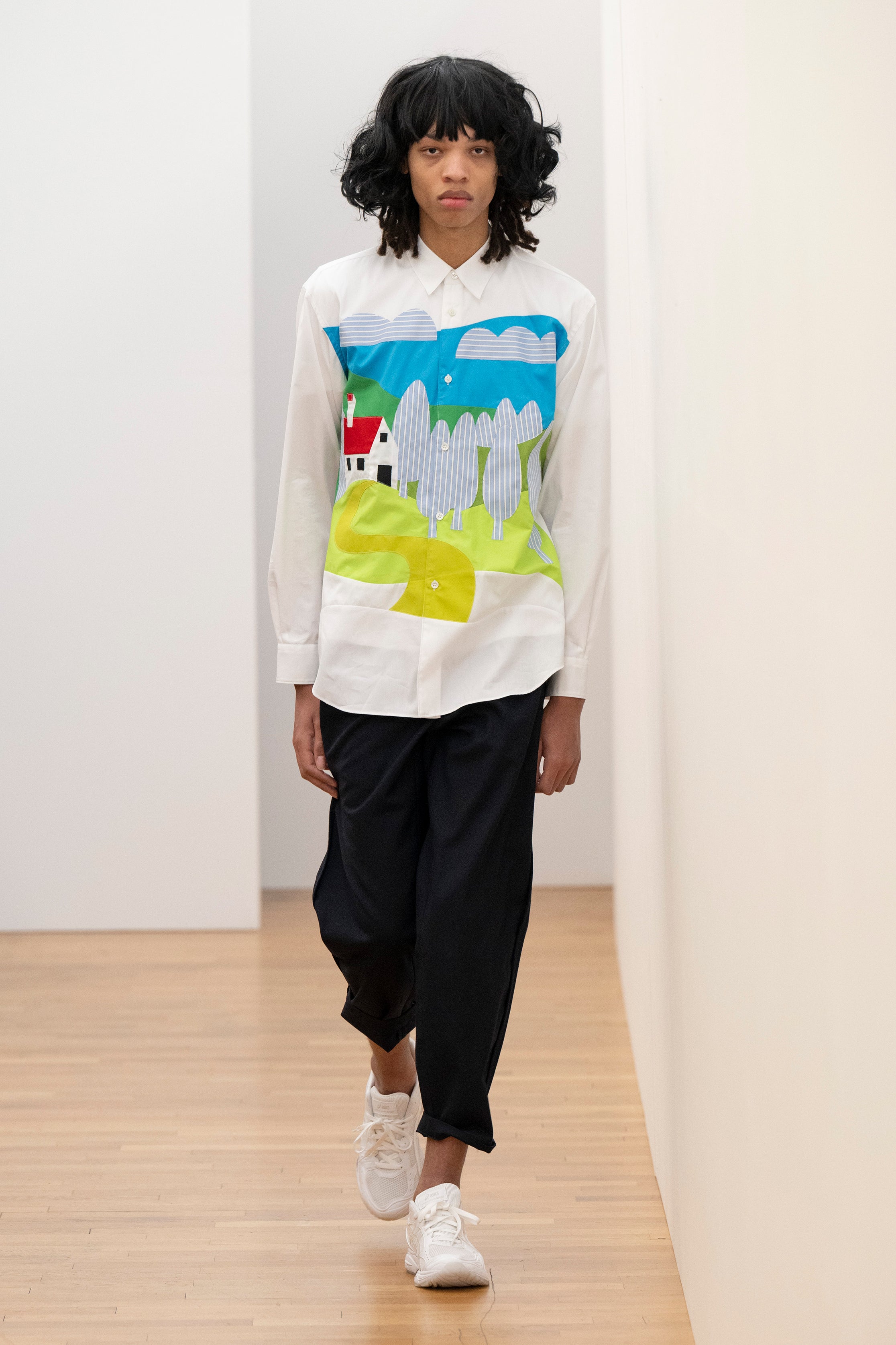 Fashion model wearing a Comme des Garçons Shirt AW25 outfit