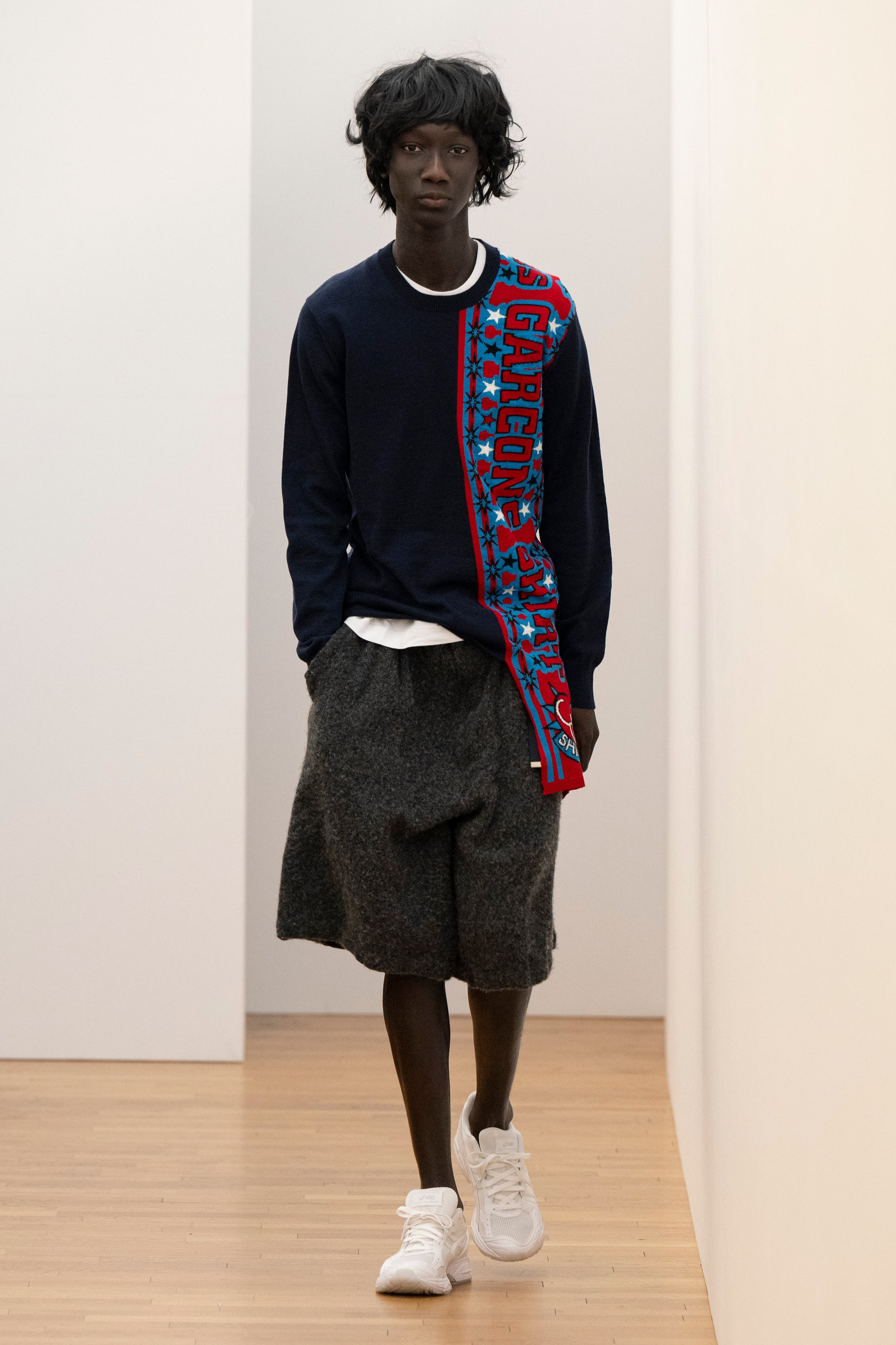 Fashion model wearing a Comme des Garçons Shirt AW25 outfit