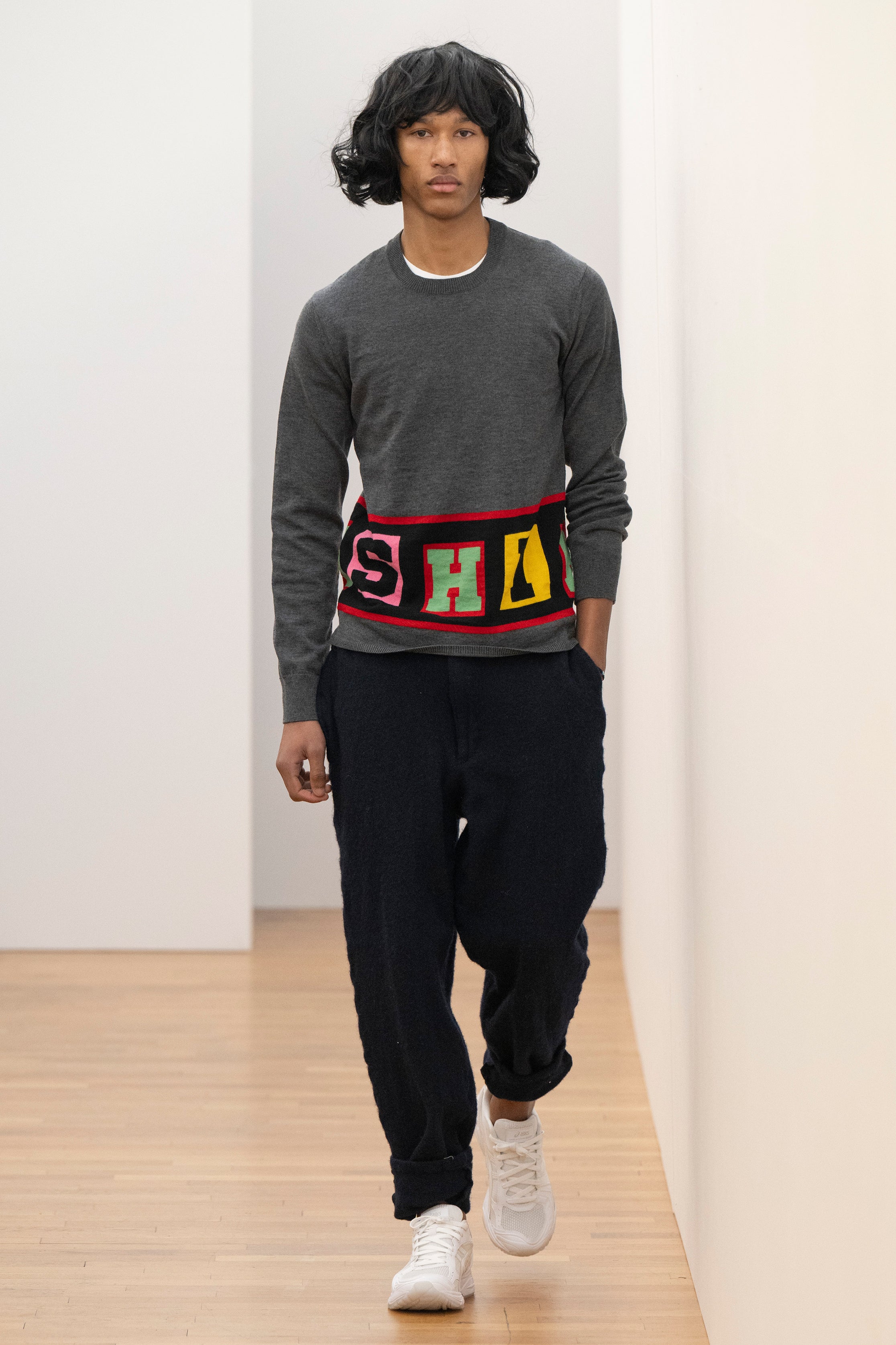 Fashion model wearing a Comme des Garçons Shirt AW25 outfit