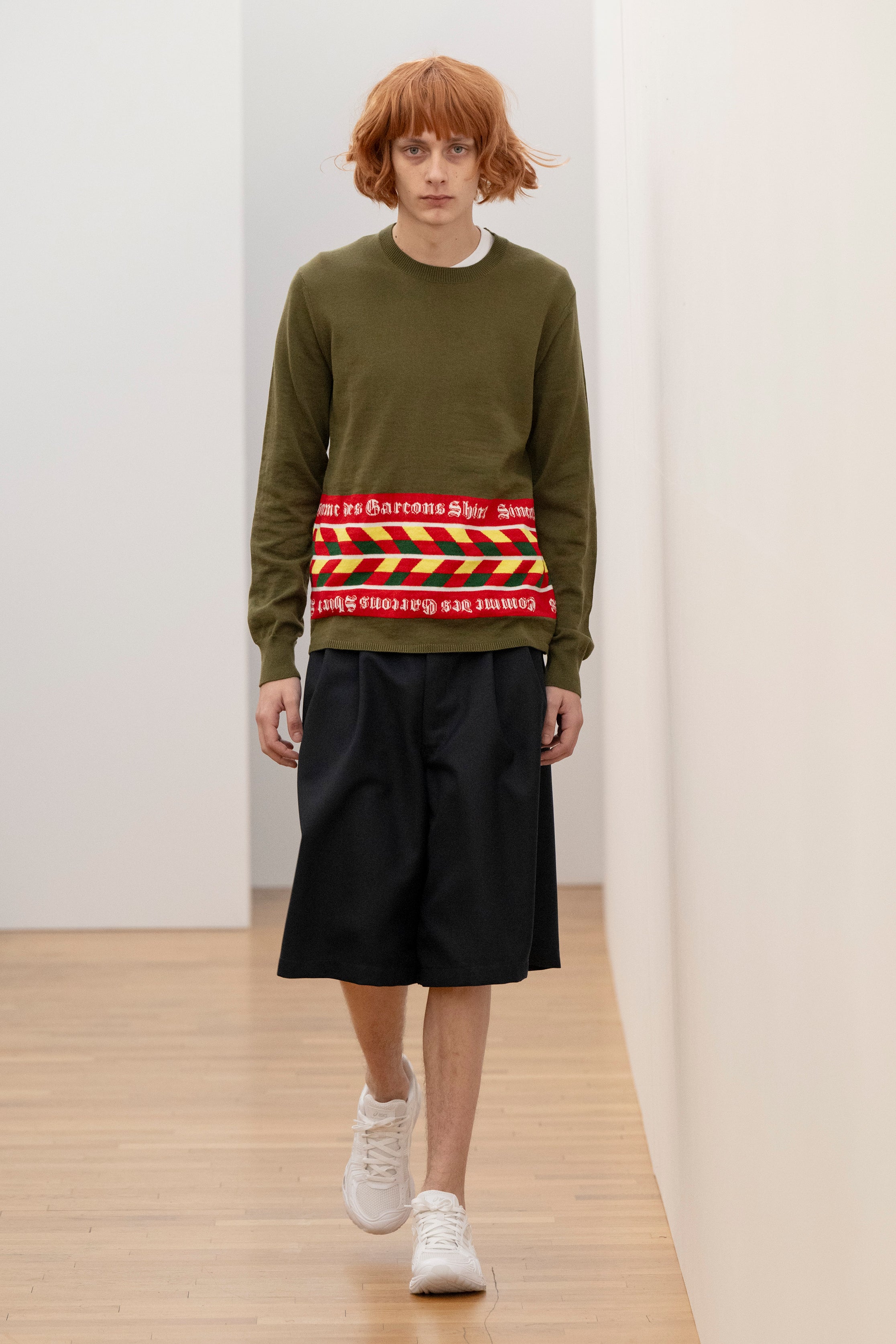 Fashion model wearing a Comme des Garçons Shirt AW25 outfit