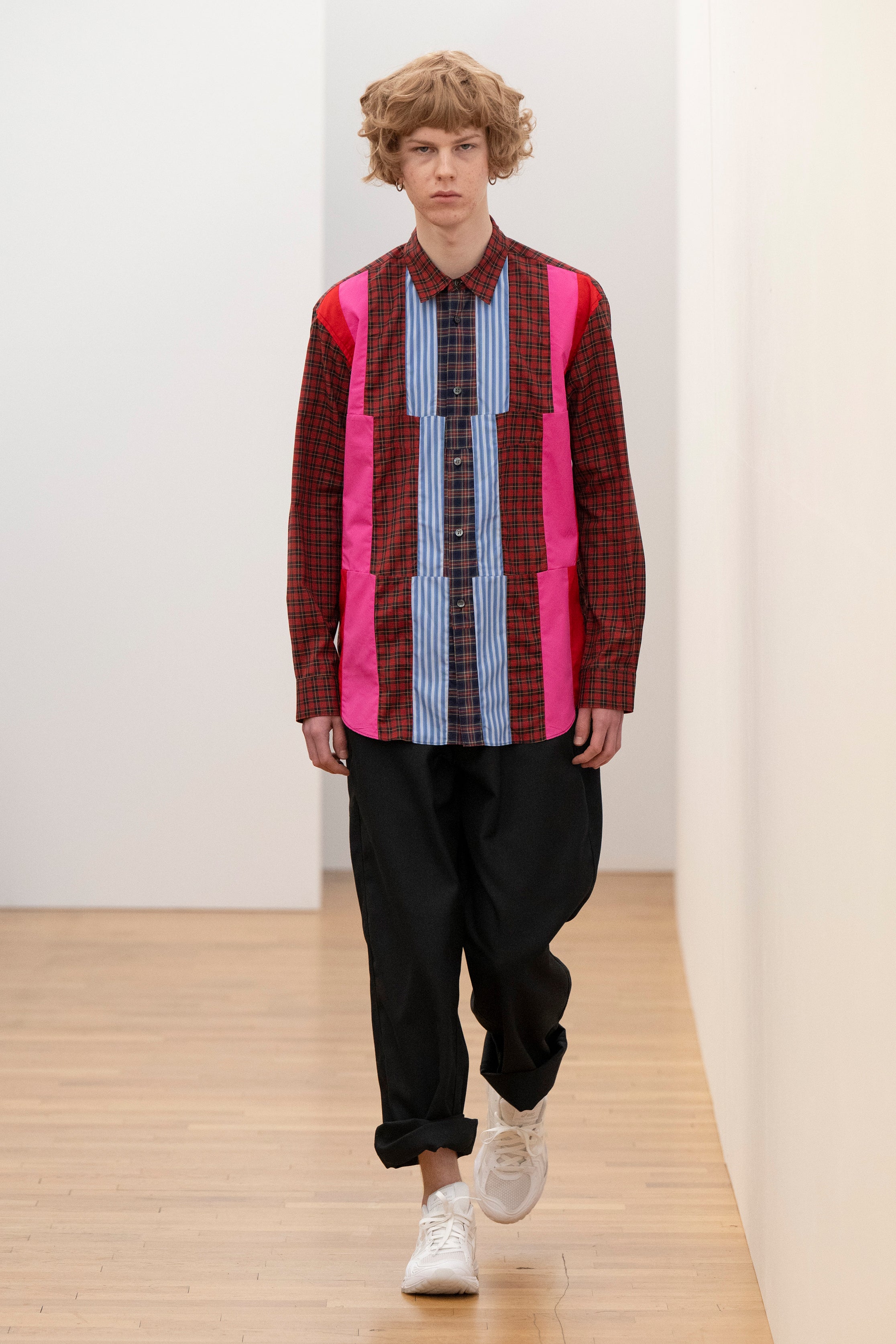 Fashion model wearing a Comme des Garçons Shirt AW25 outfit