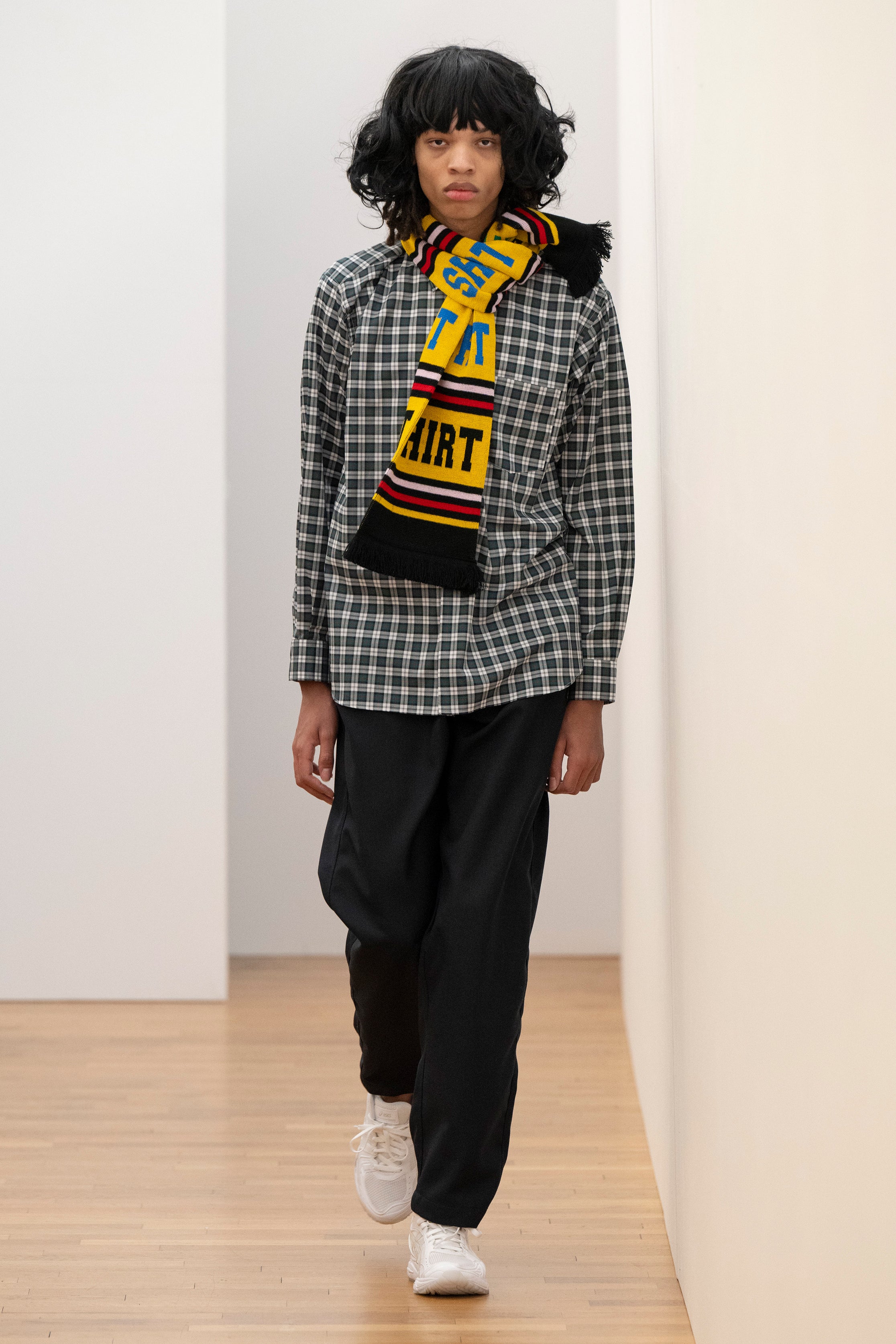 Fashion model wearing a Comme des Garçons Shirt AW25 outfit