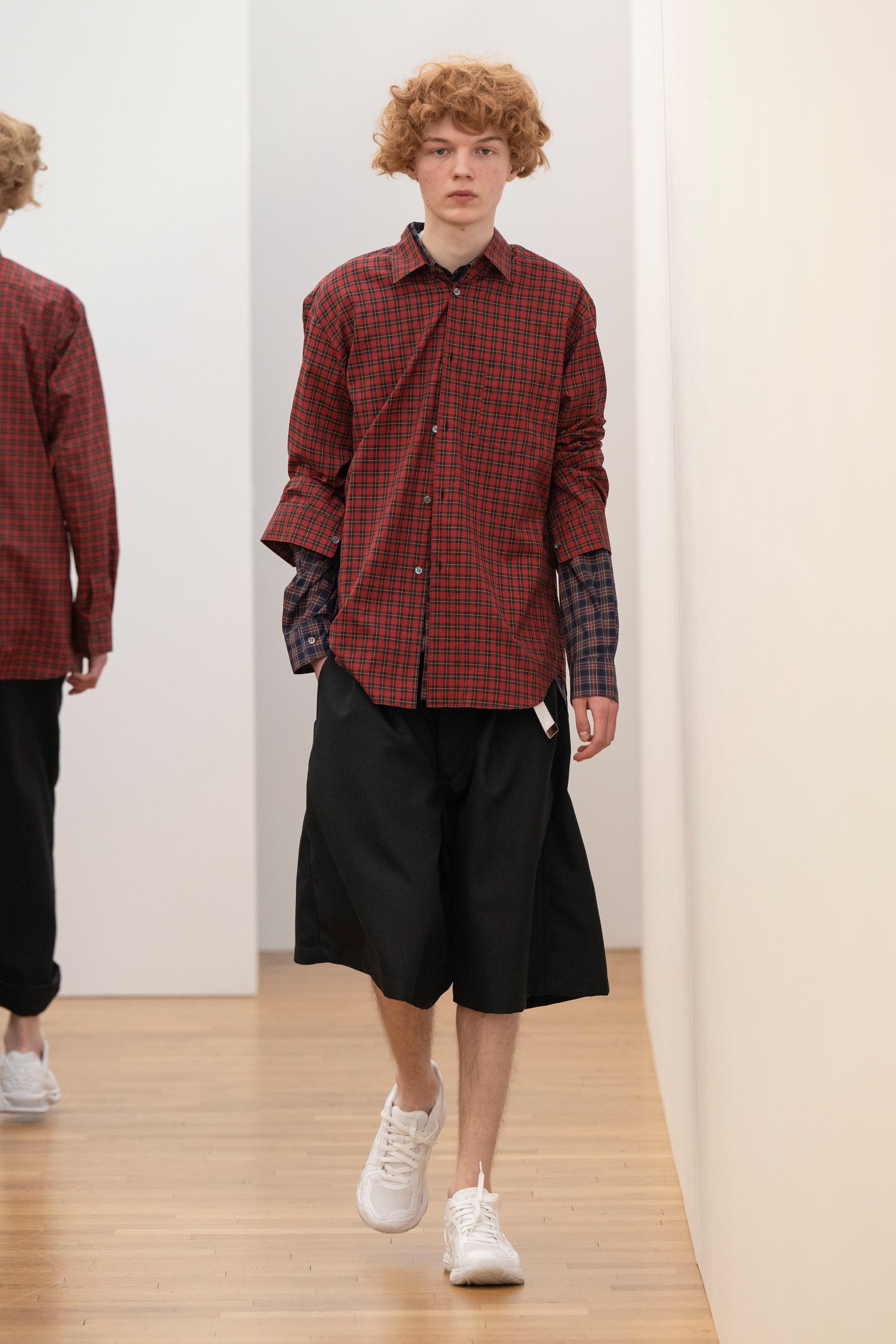 Fashion model wearing a Comme des Garçons Shirt AW25 outfit