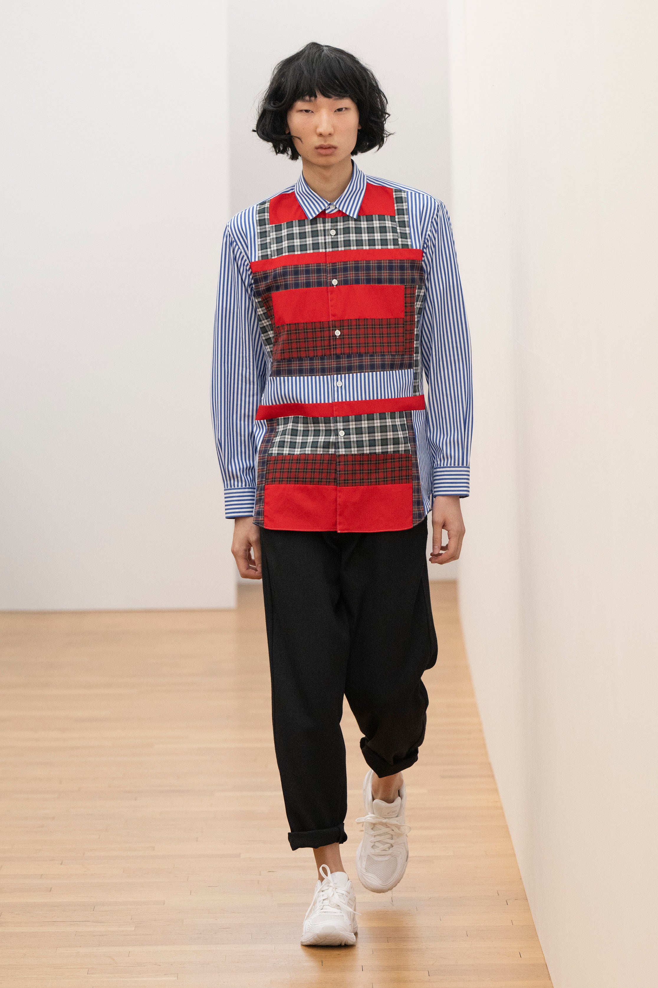 Fashion model wearing a Comme des Garçons Shirt AW25 outfit