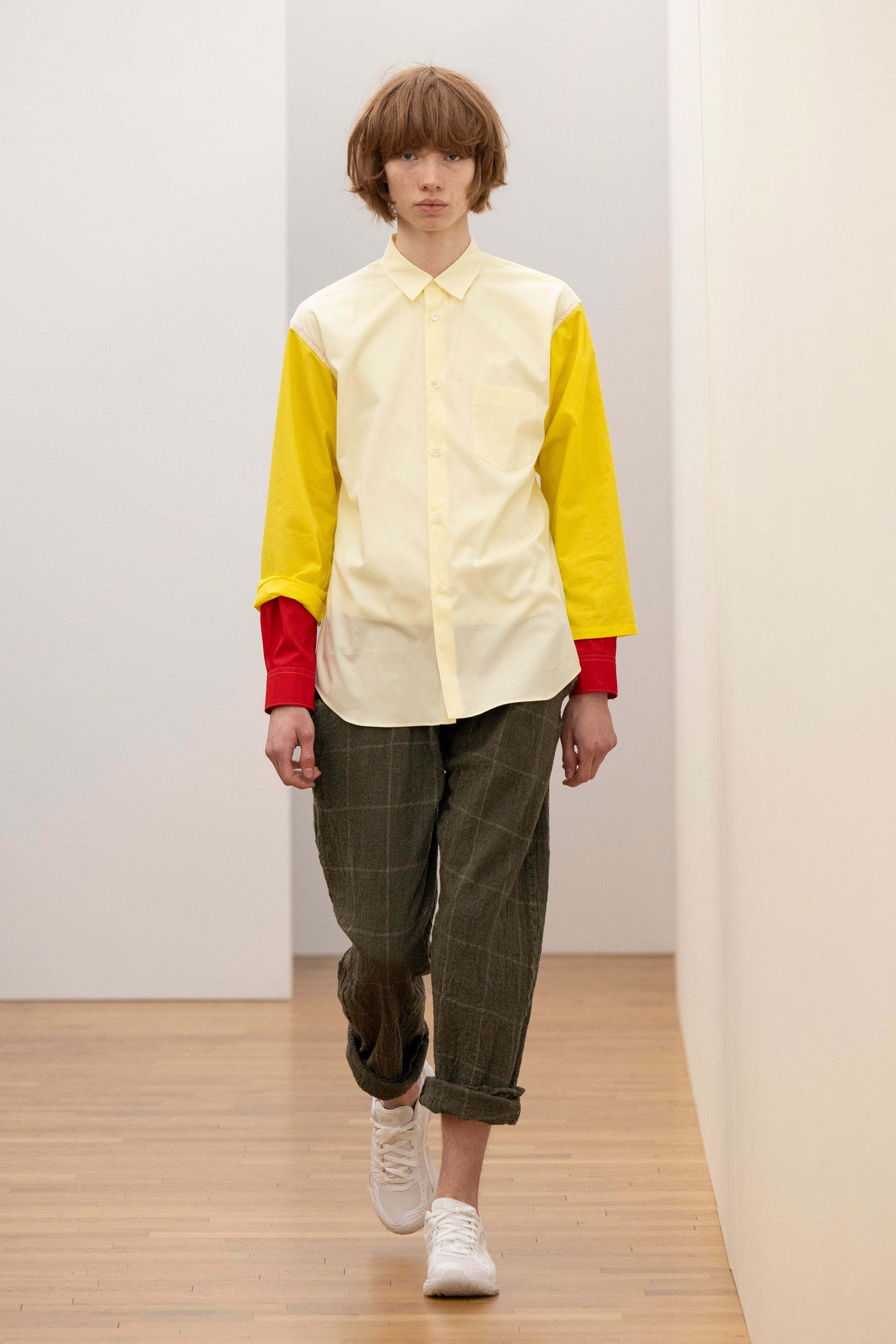 Fashion model wearing a Comme des Garçons Shirt AW25 outfit