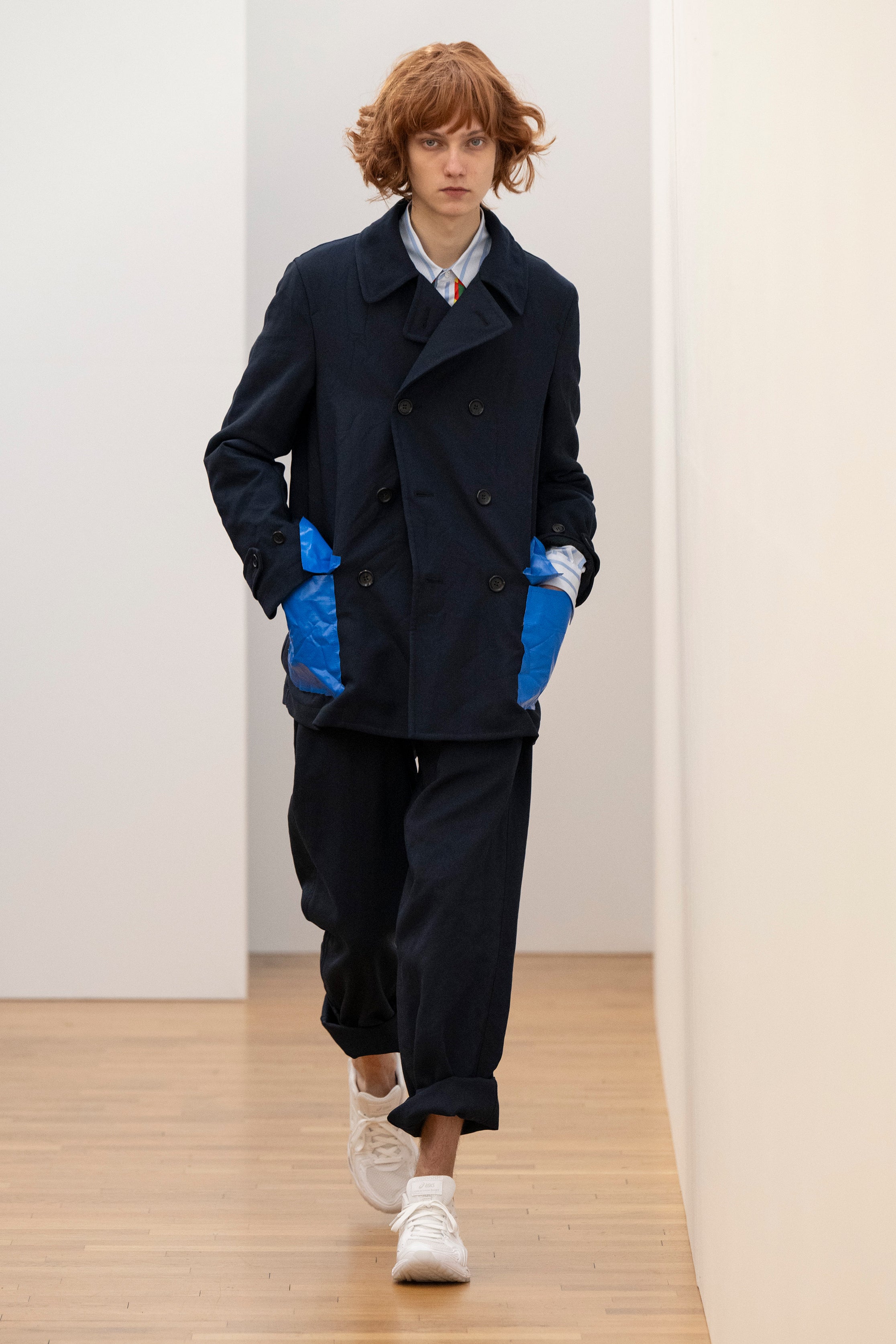 Fashion model wearing a Comme des Garçons Shirt AW25 outfit