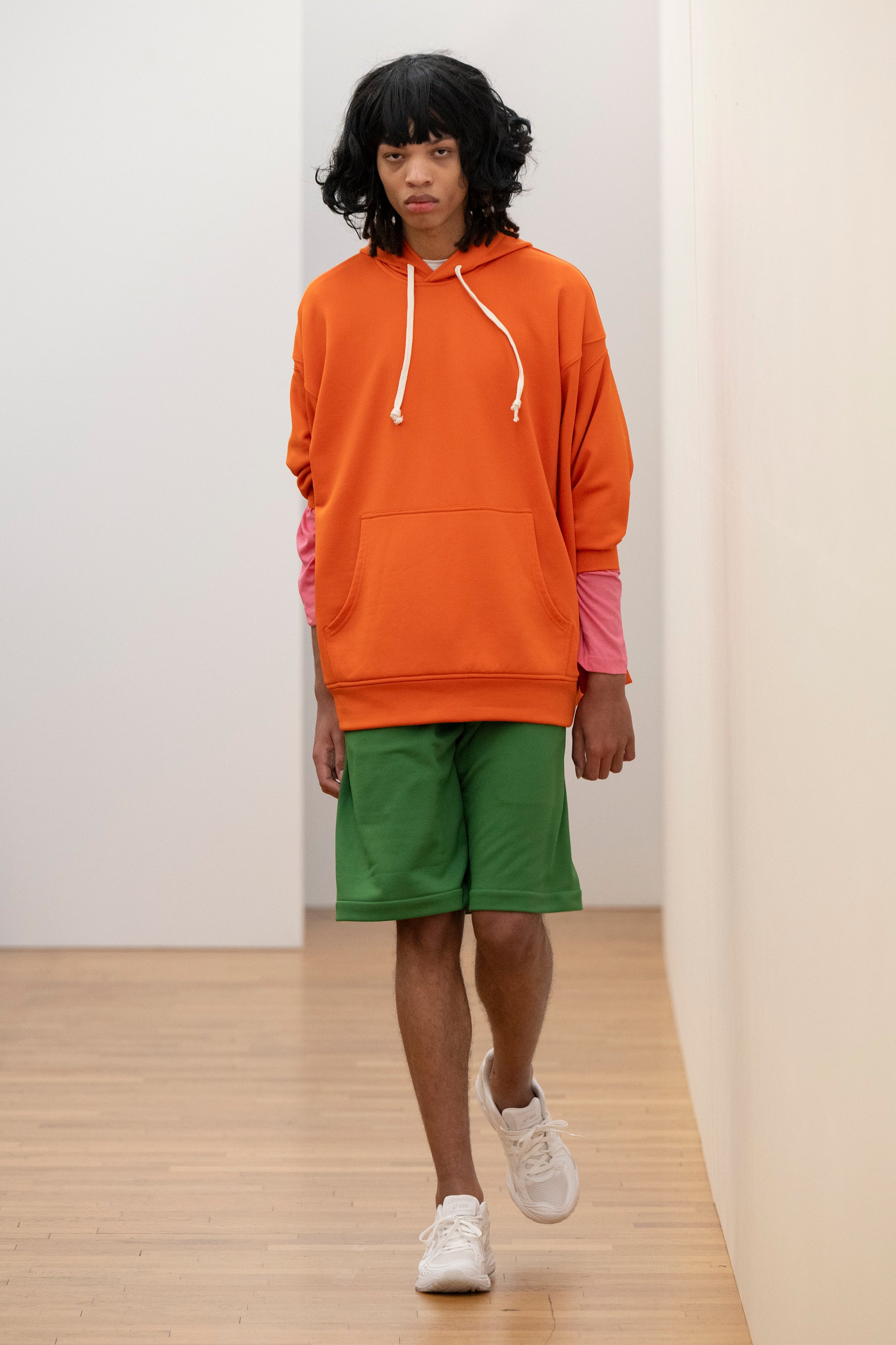 Fashion model wearing a Comme des Garçons Shirt AW25 outfit