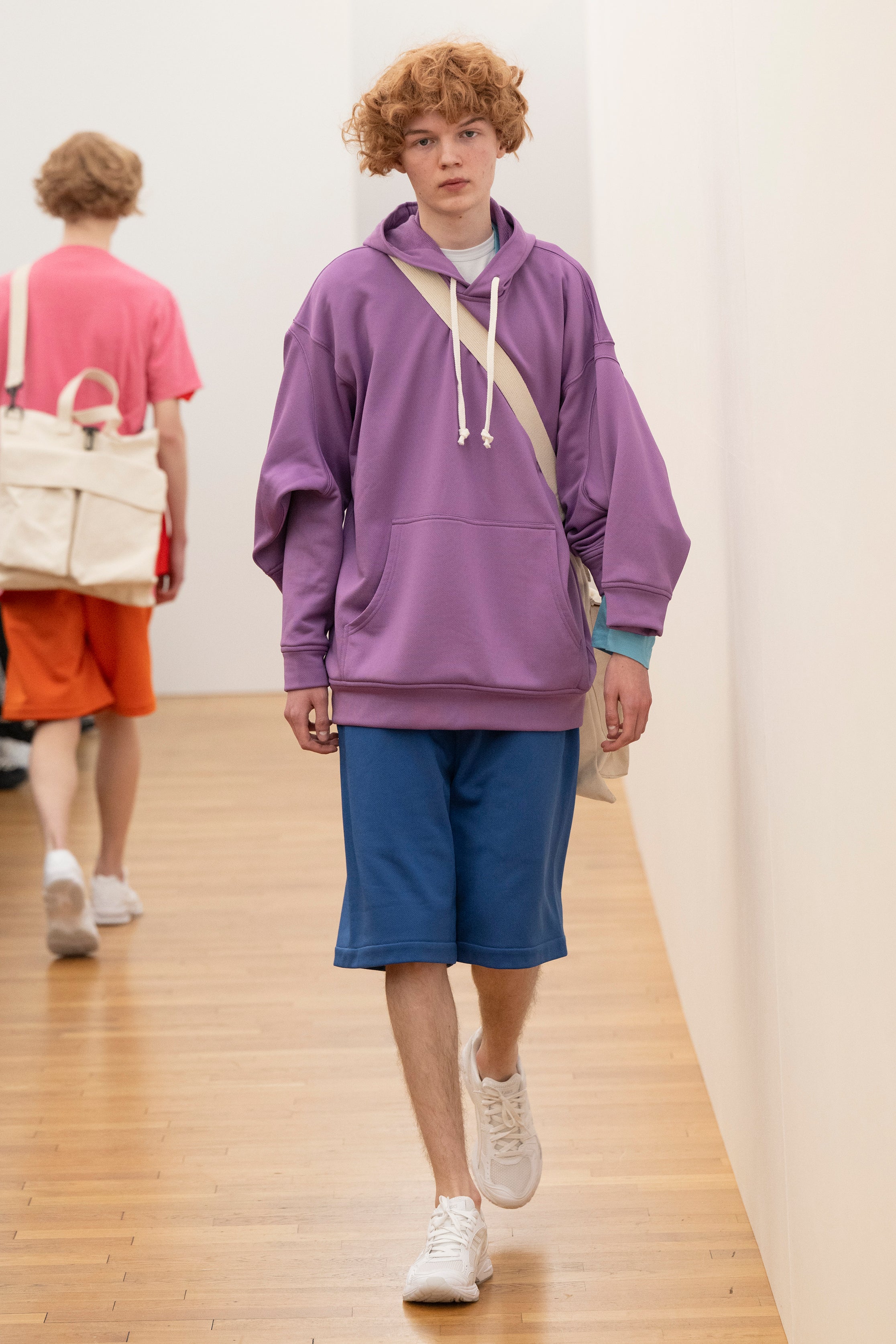 Fashion model wearing a Comme des Garçons Shirt AW25 outfit