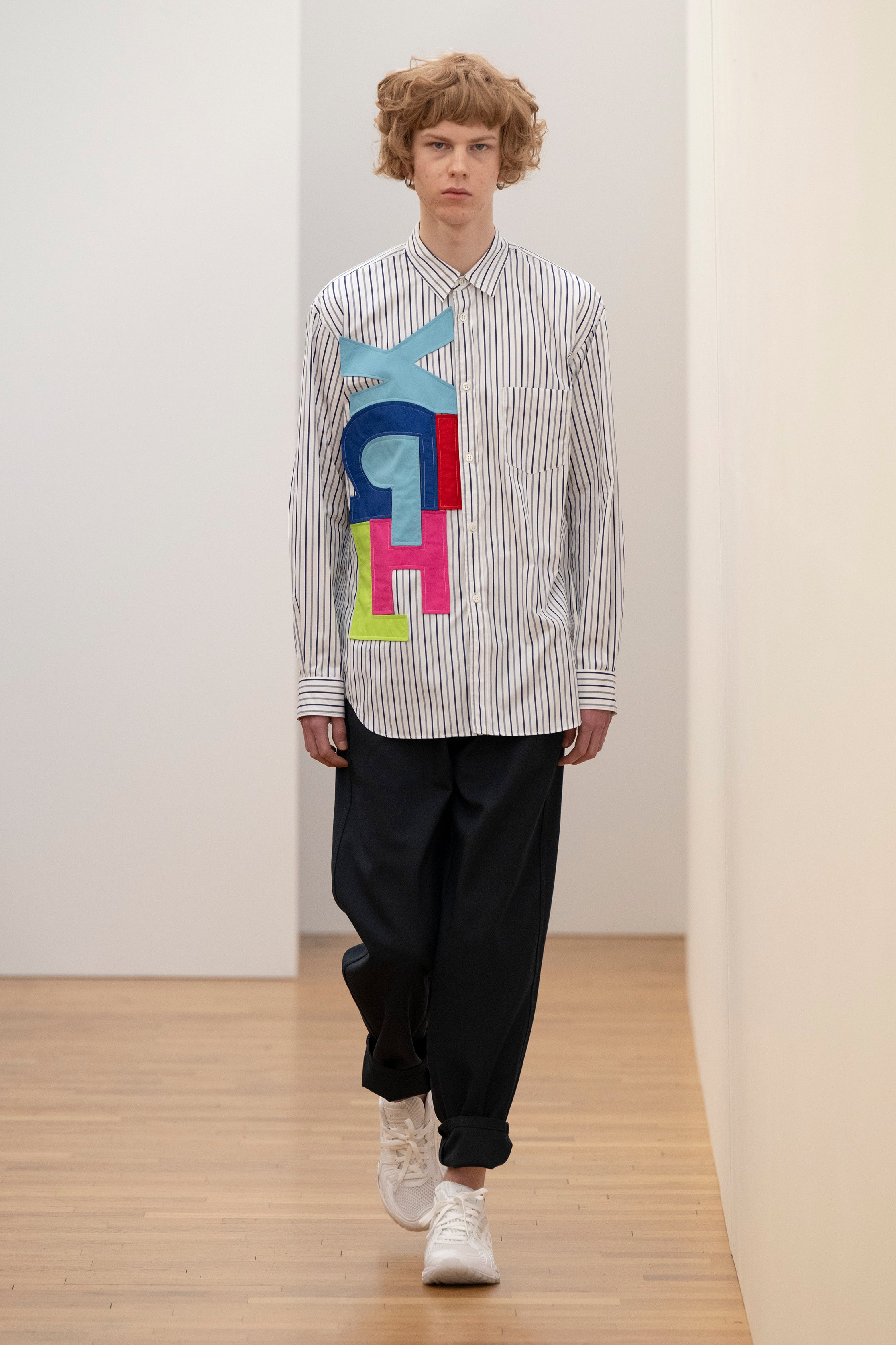Fashion model wearing a Comme des Garçons Shirt AW25 outfit