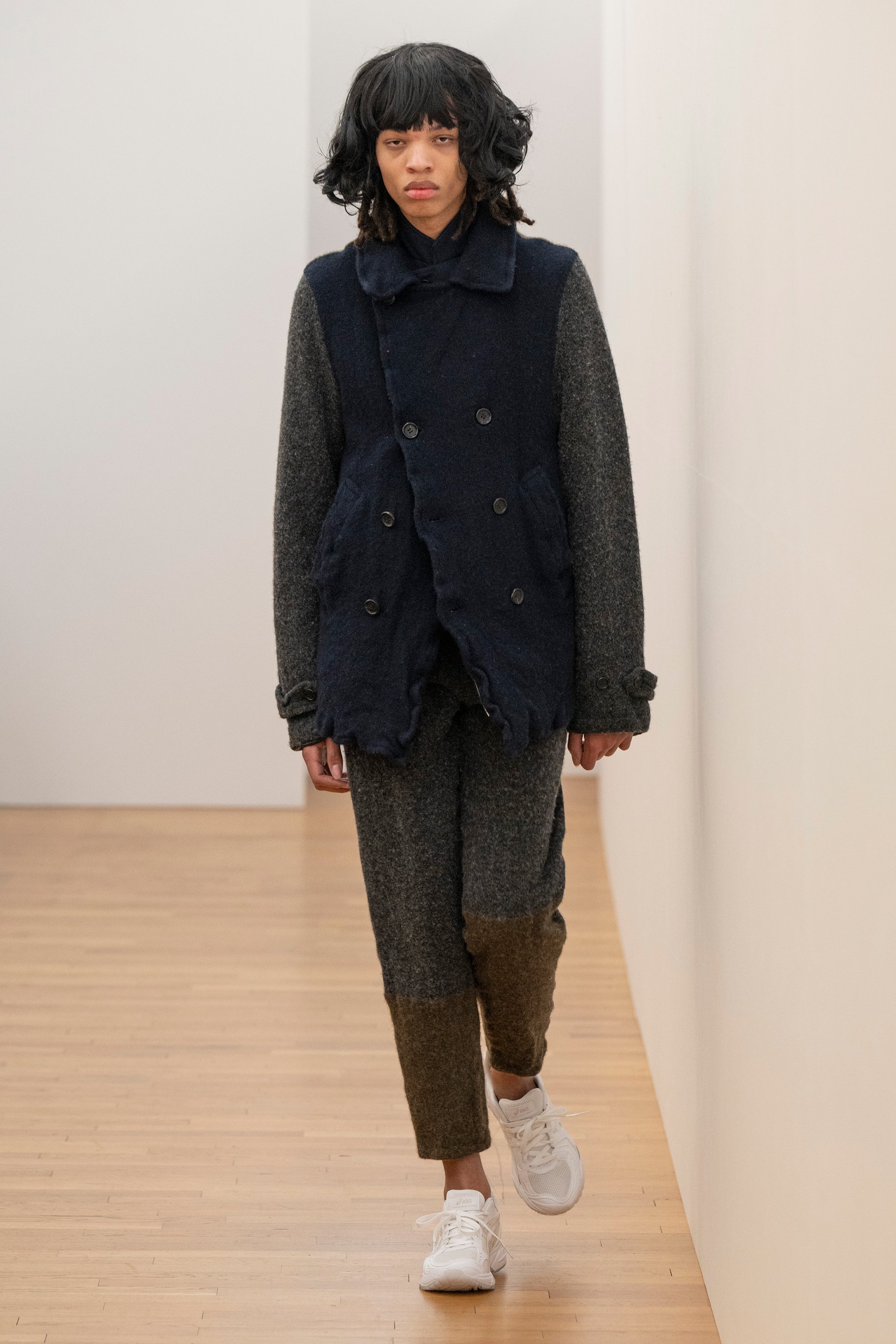 Fashion model wearing a Comme des Garçons Shirt AW25 outfit