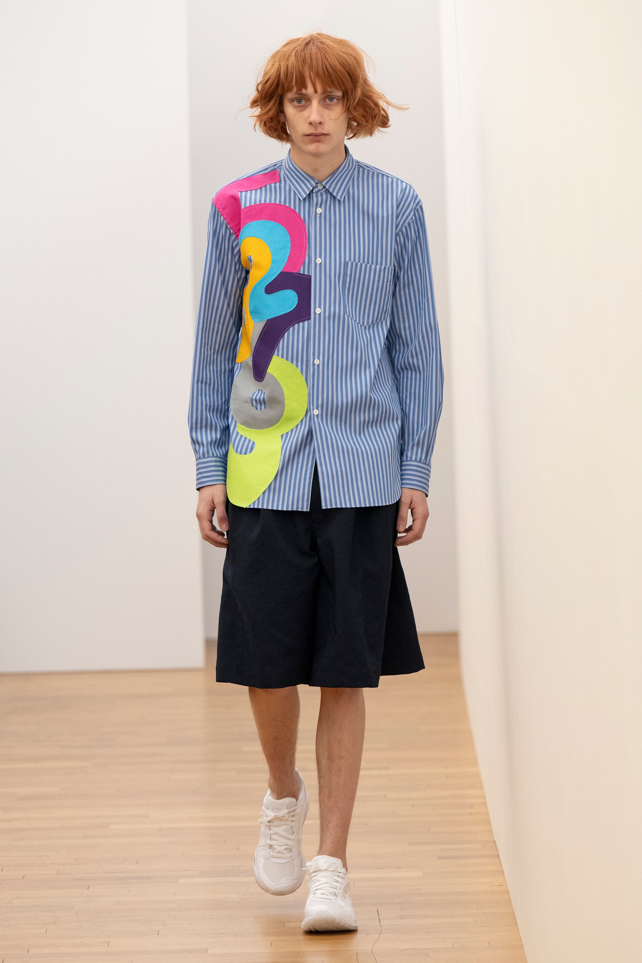 Fashion model wearing a Comme des Garçons Shirt AW25 outfit