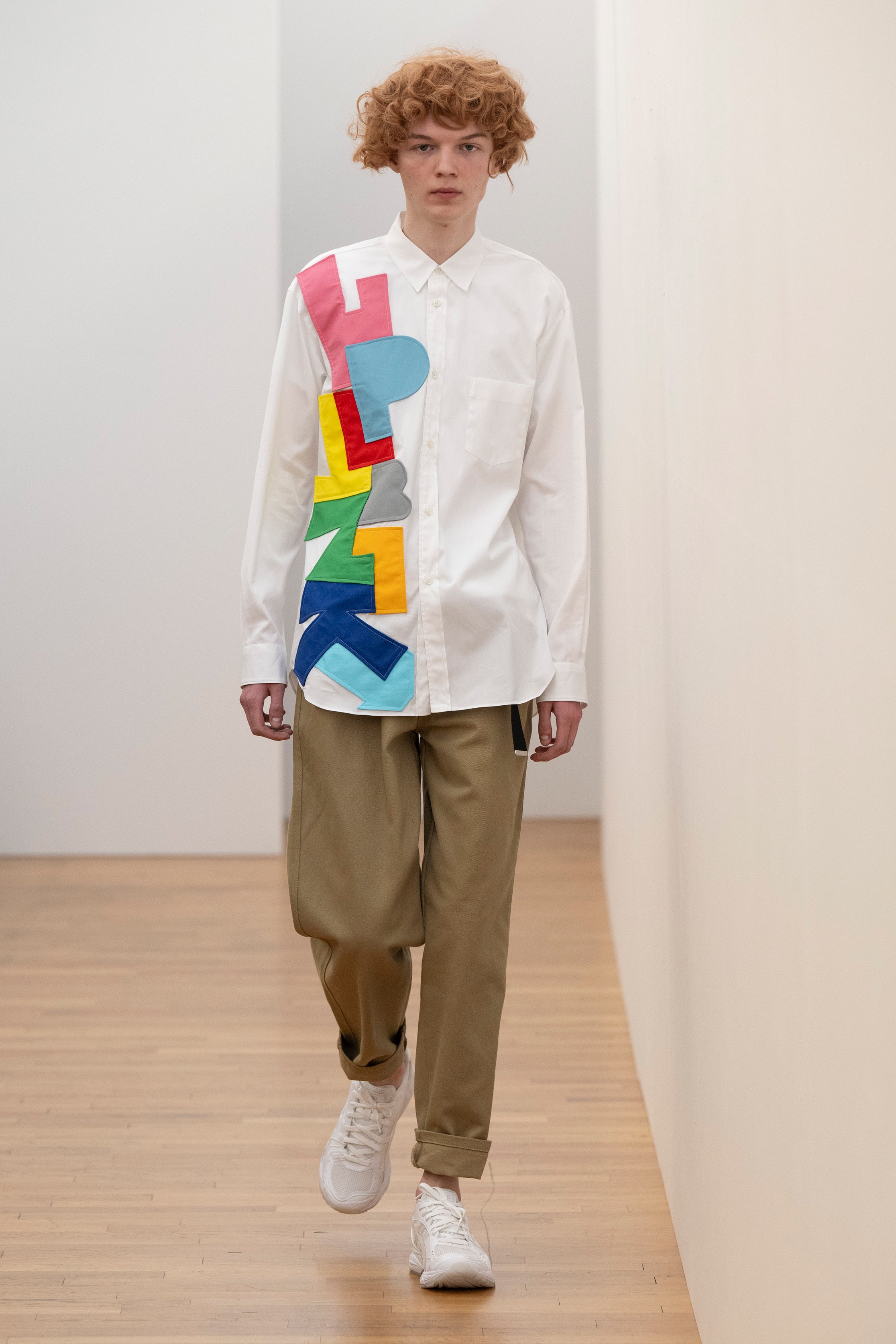 Fashion model wearing a Comme des Garçons Shirt AW25 outfit