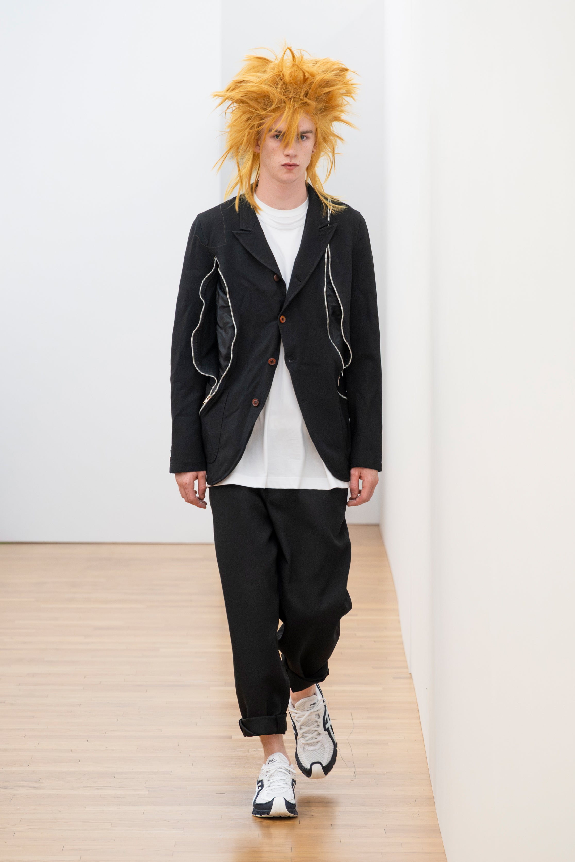 Fashion model wearing a Comme des Garçons Shirt SS26 outfit