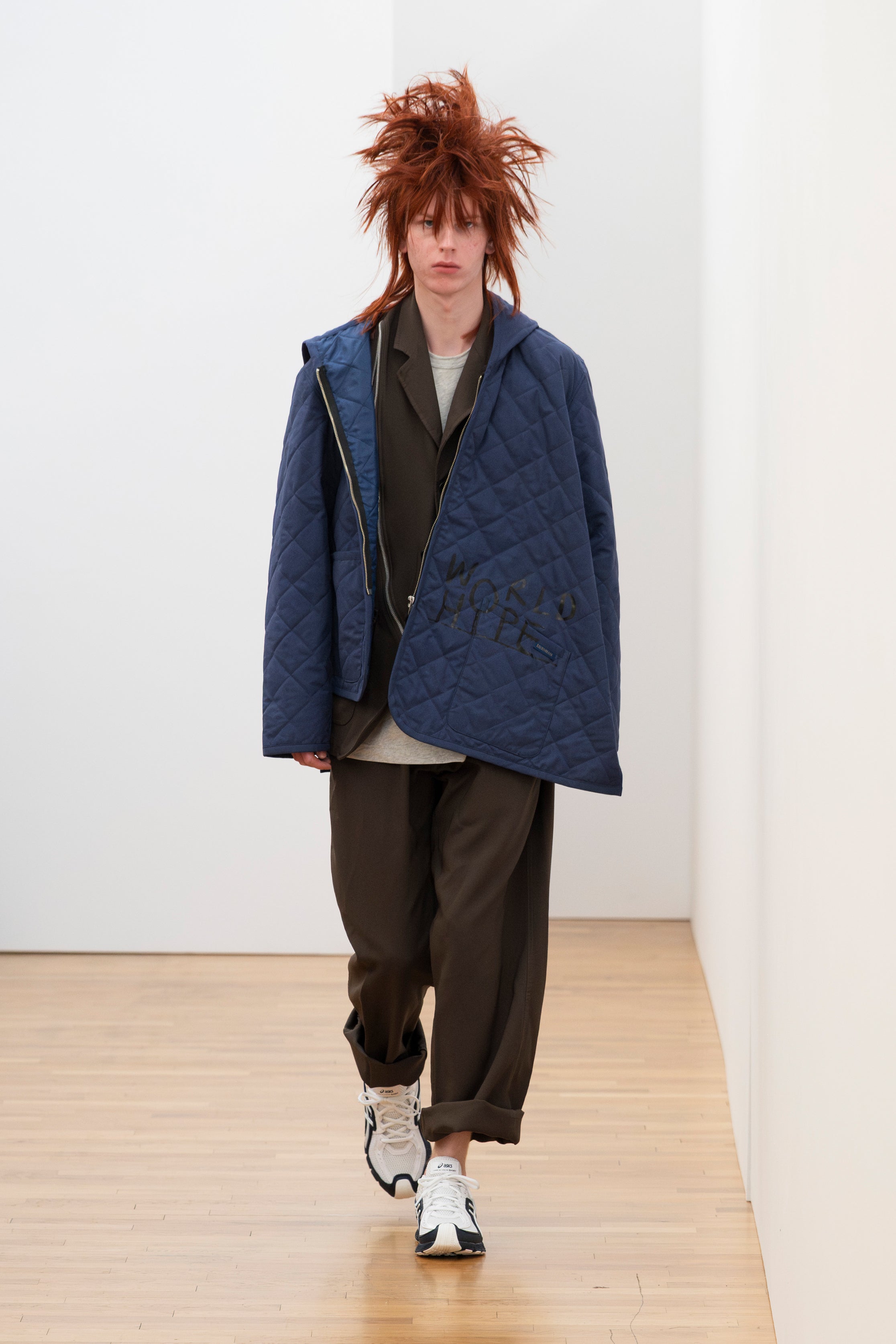 Fashion model wearing a Comme des Garçons Shirt SS26 outfit