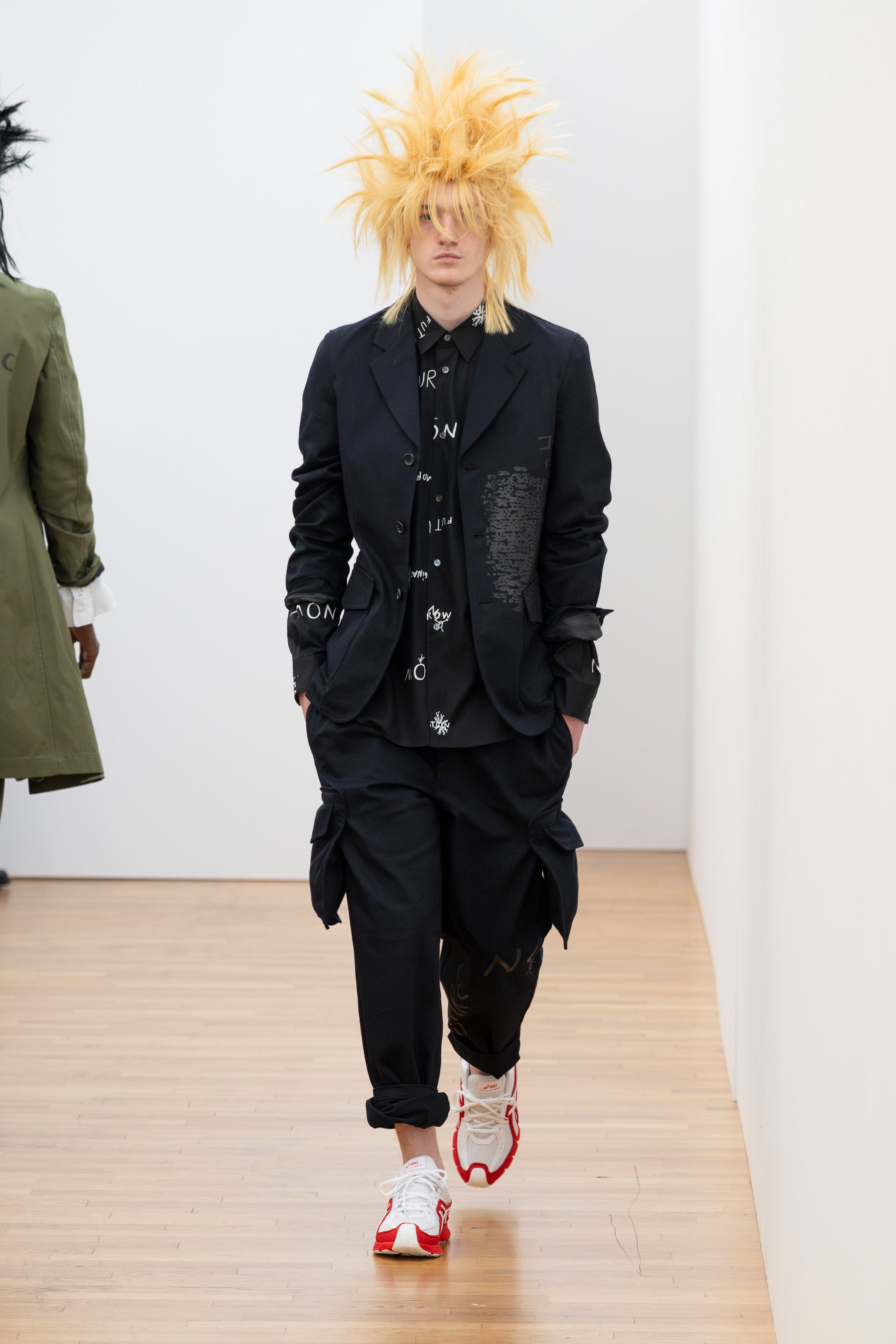 Fashion model wearing a Comme des Garçons Shirt SS26 outfit