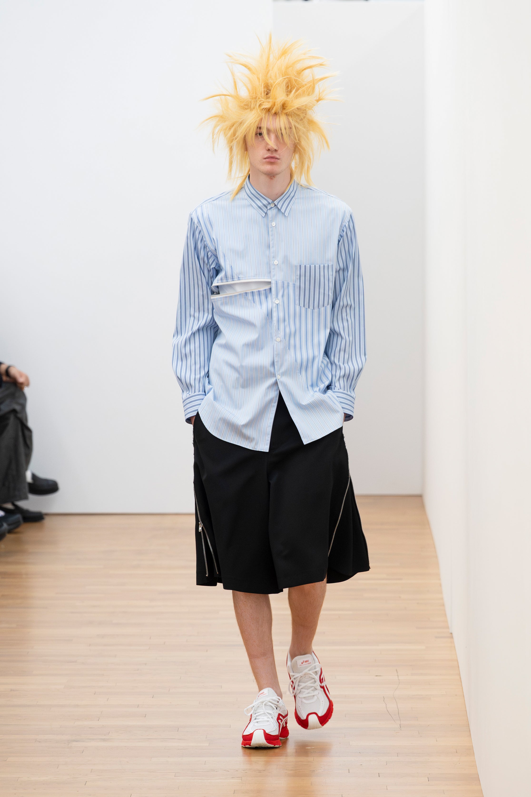 Fashion model wearing a Comme des Garçons Shirt SS26 outfit