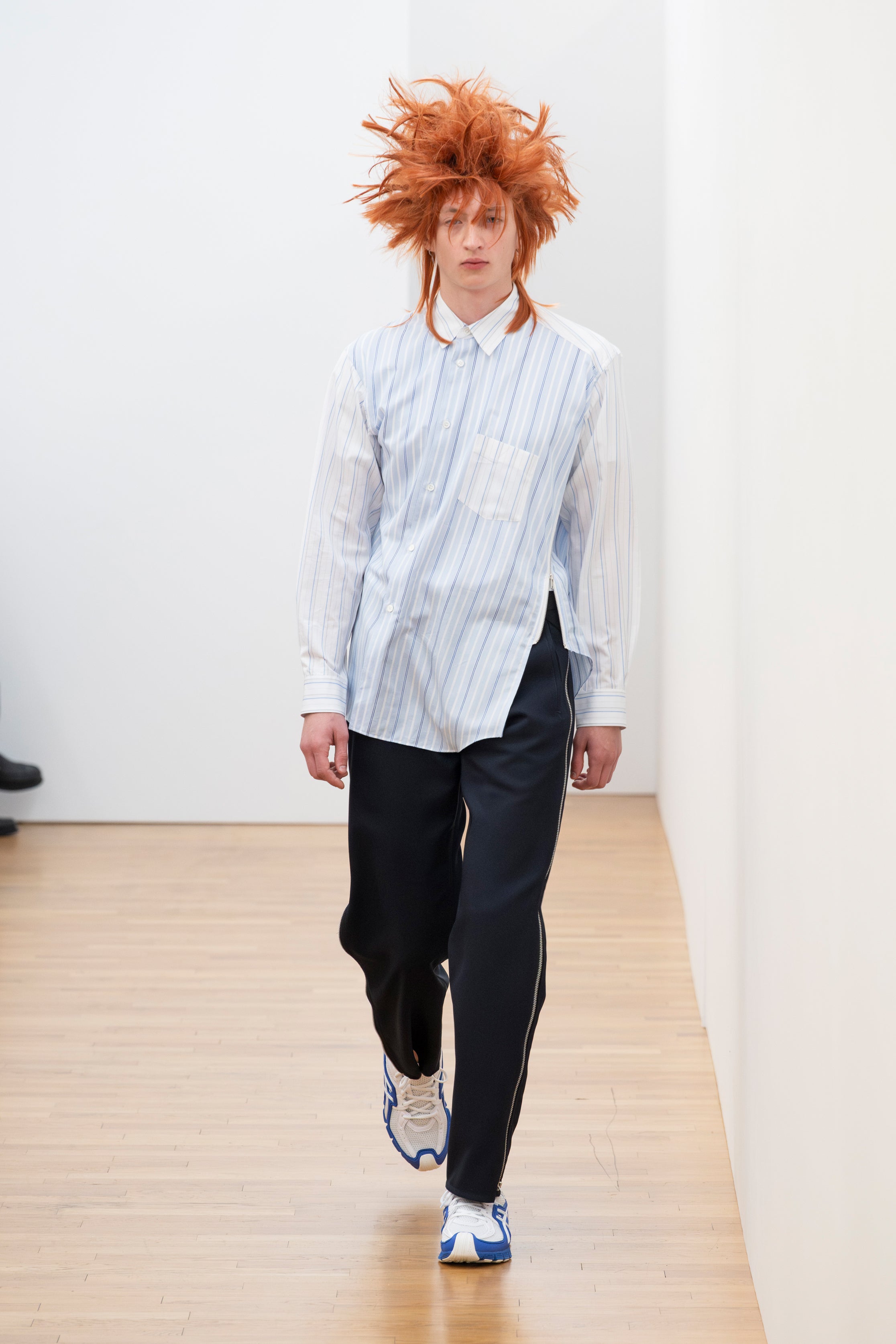 Fashion model wearing a Comme des Garçons Shirt SS26 outfit