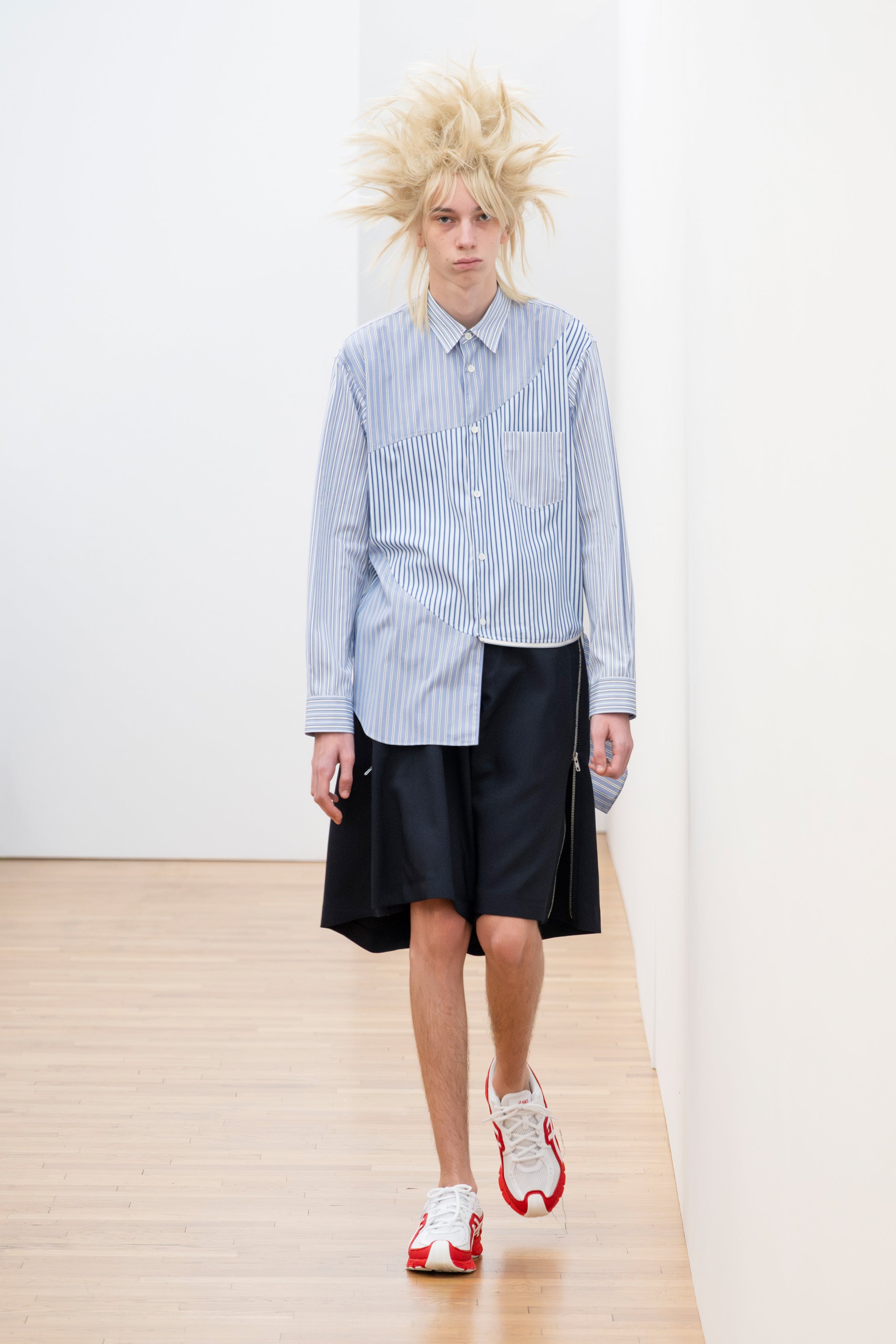 Fashion model wearing a Comme des Garçons Shirt SS26 outfit