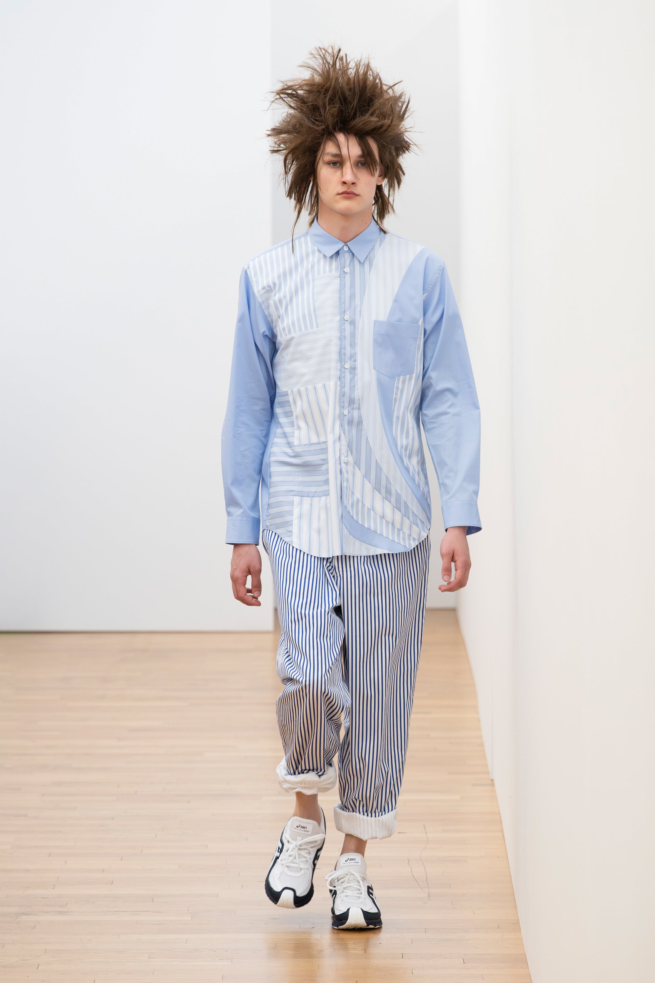 Fashion model wearing a Comme des Garçons Shirt SS26 outfit