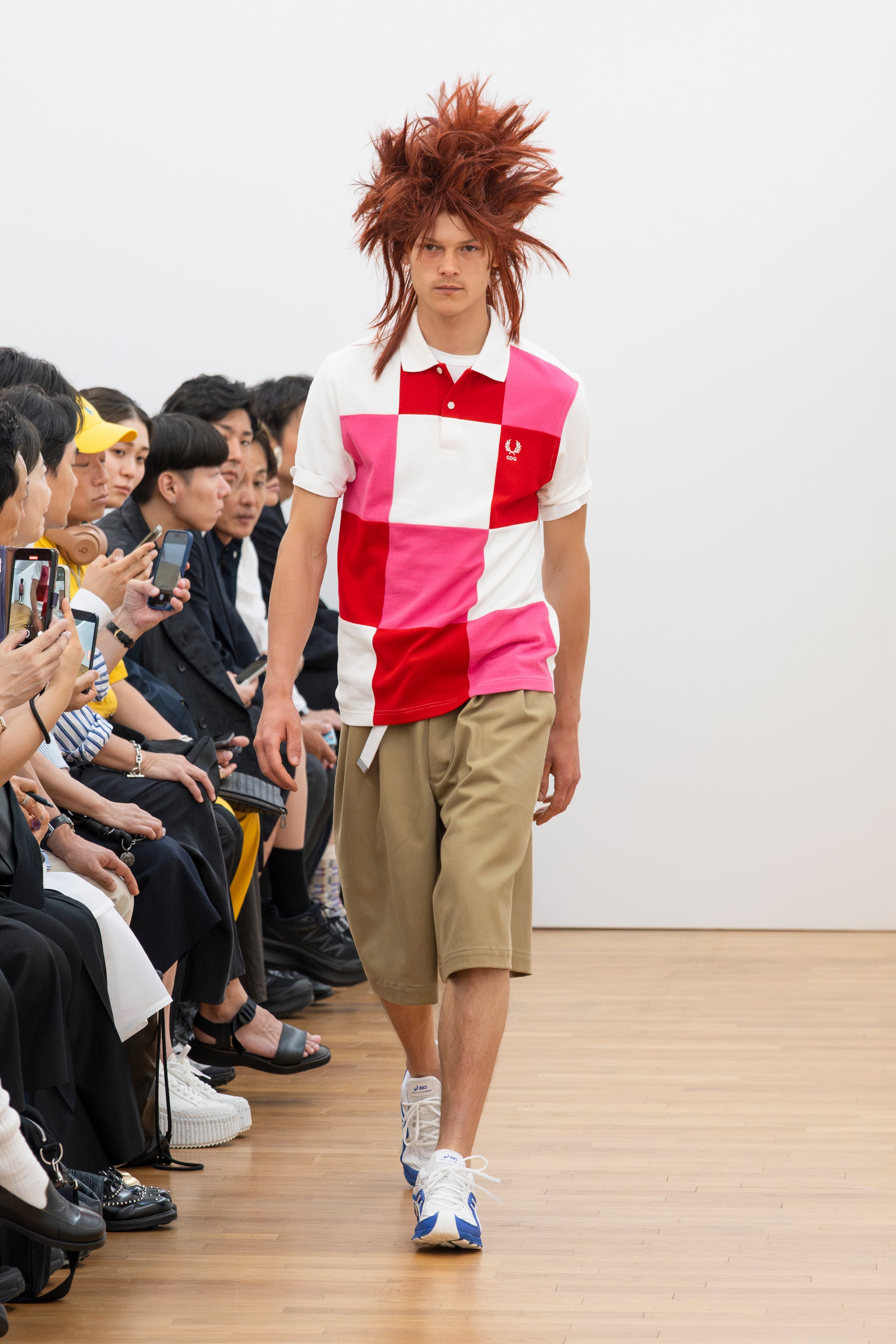 Fashion model wearing a Comme des Garçons Shirt SS26 outfit