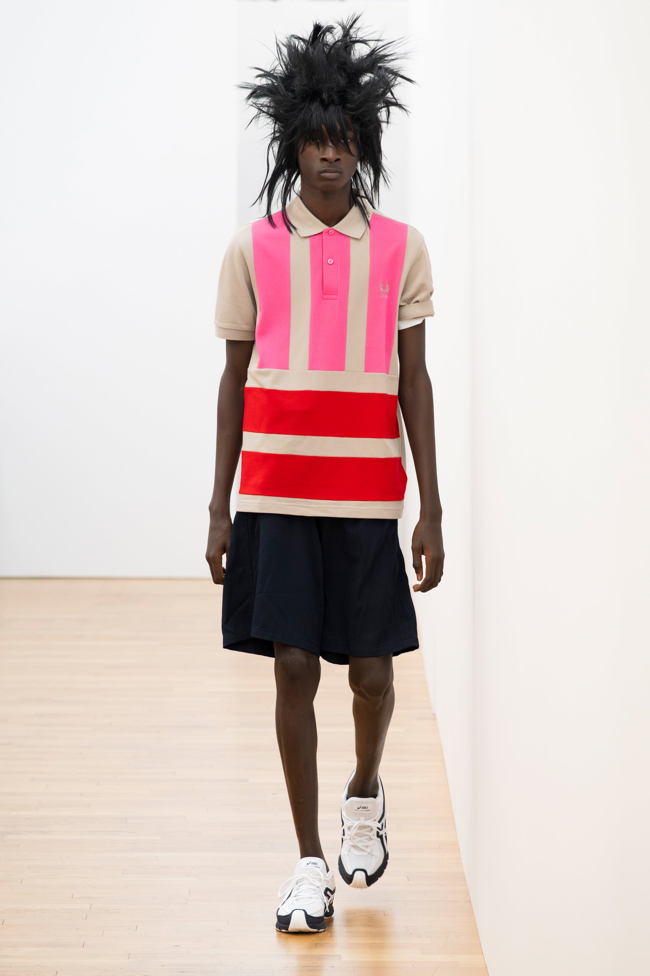 Fashion model wearing a Comme des Garçons Shirt SS26 outfit