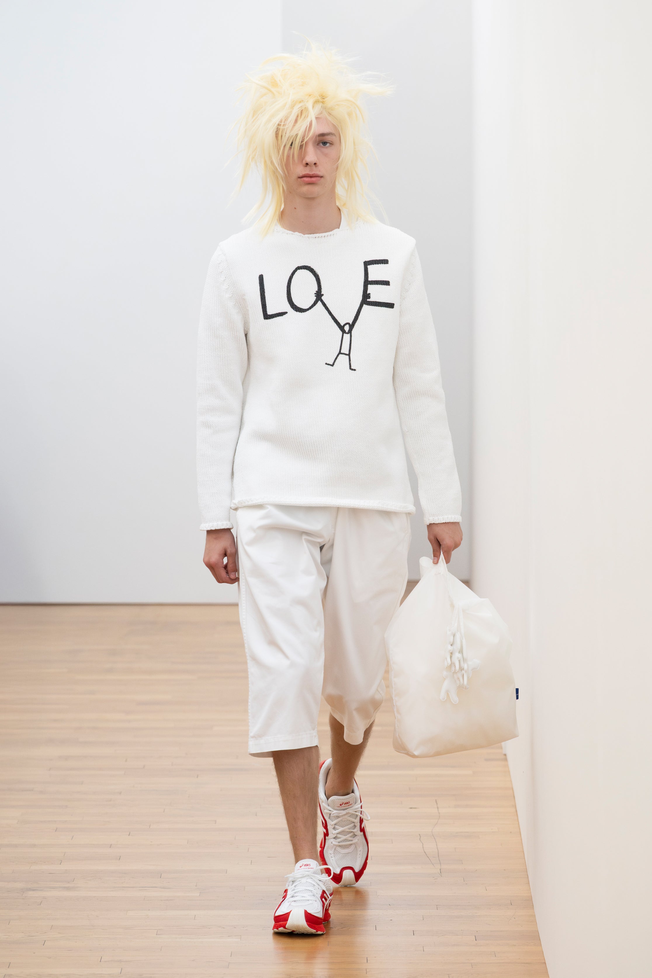 Fashion model wearing a Comme des Garçons Shirt SS26 outfit