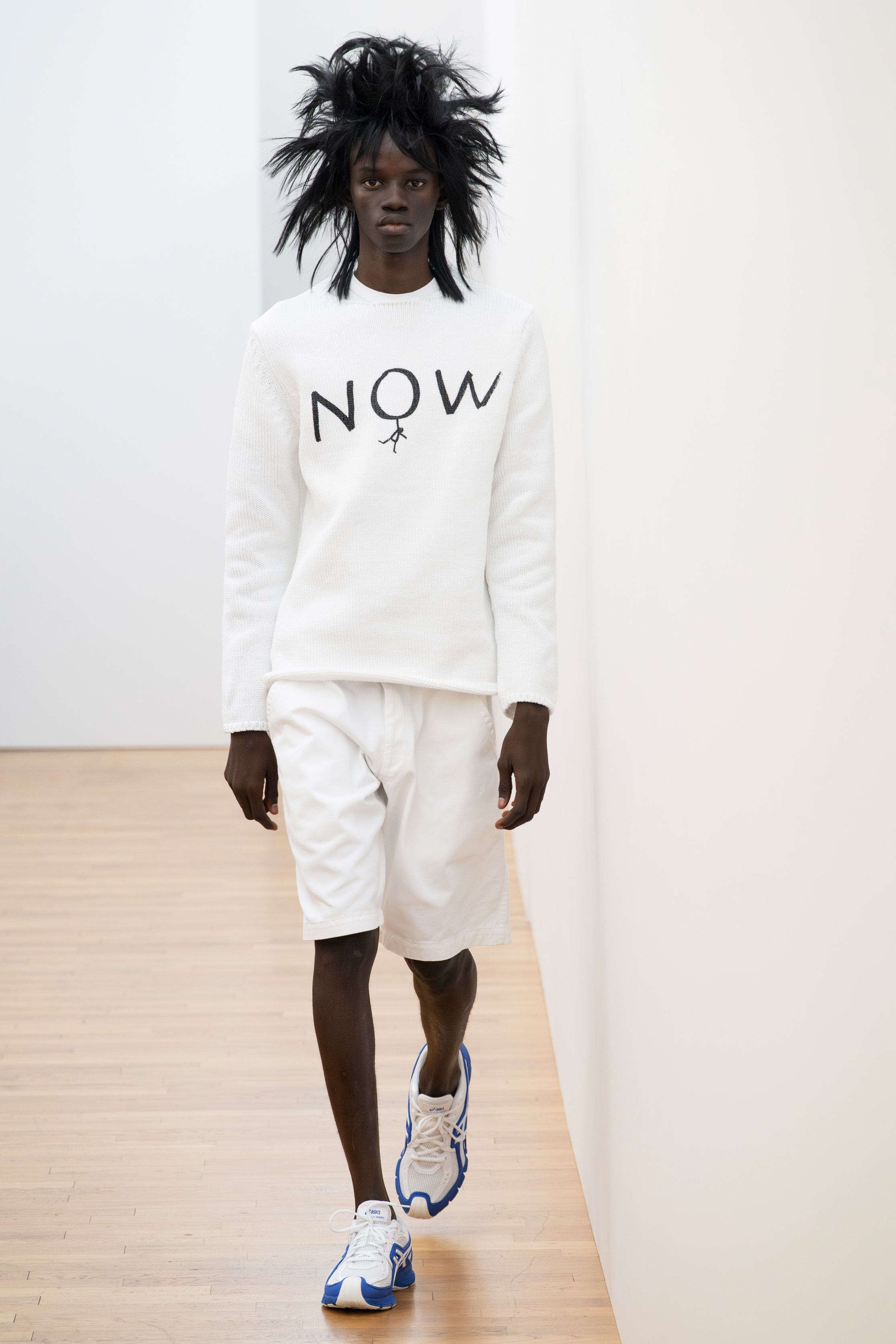 Fashion model wearing a Comme des Garçons Shirt SS26 outfit