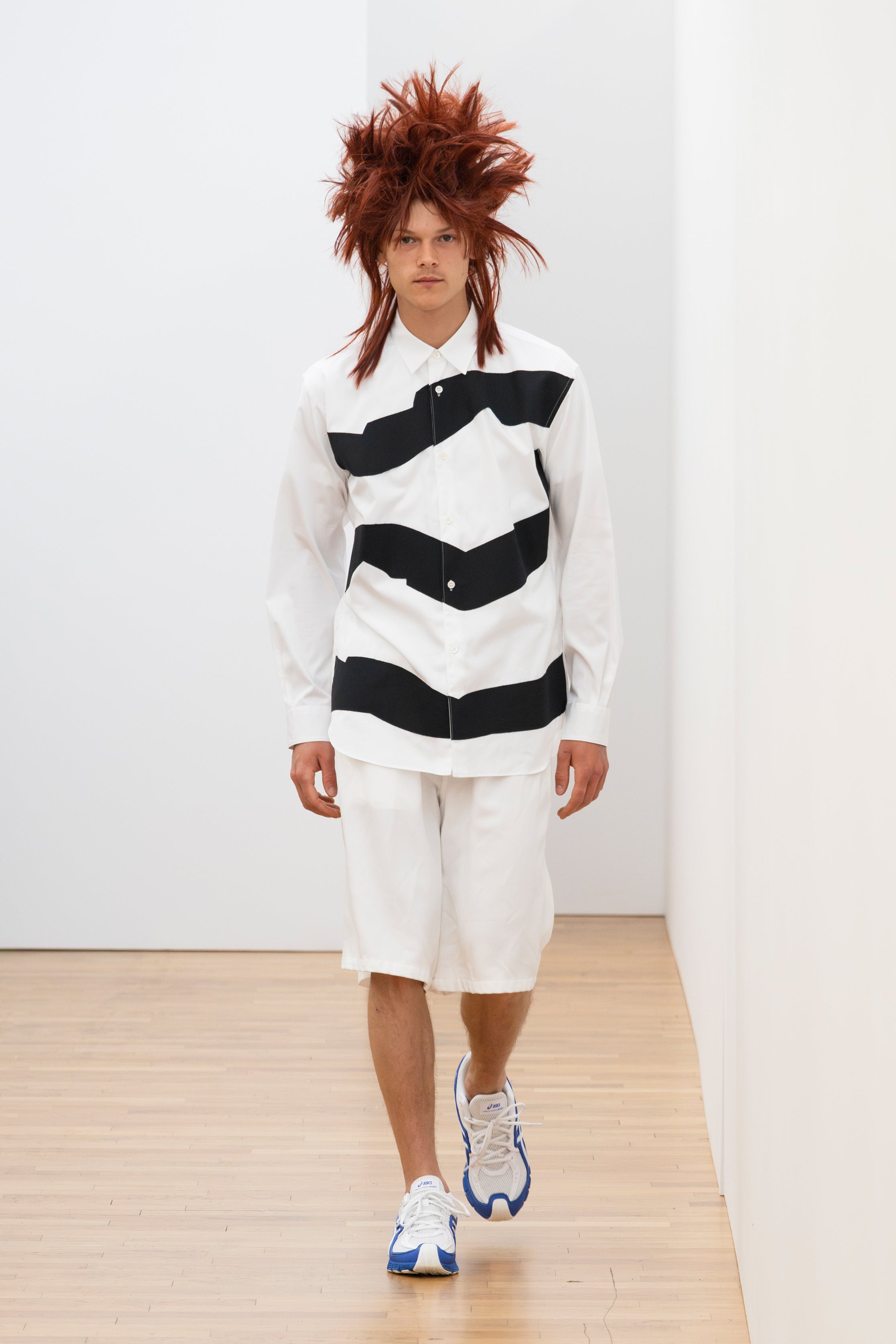 Fashion model wearing a Comme des Garçons Shirt SS26 outfit