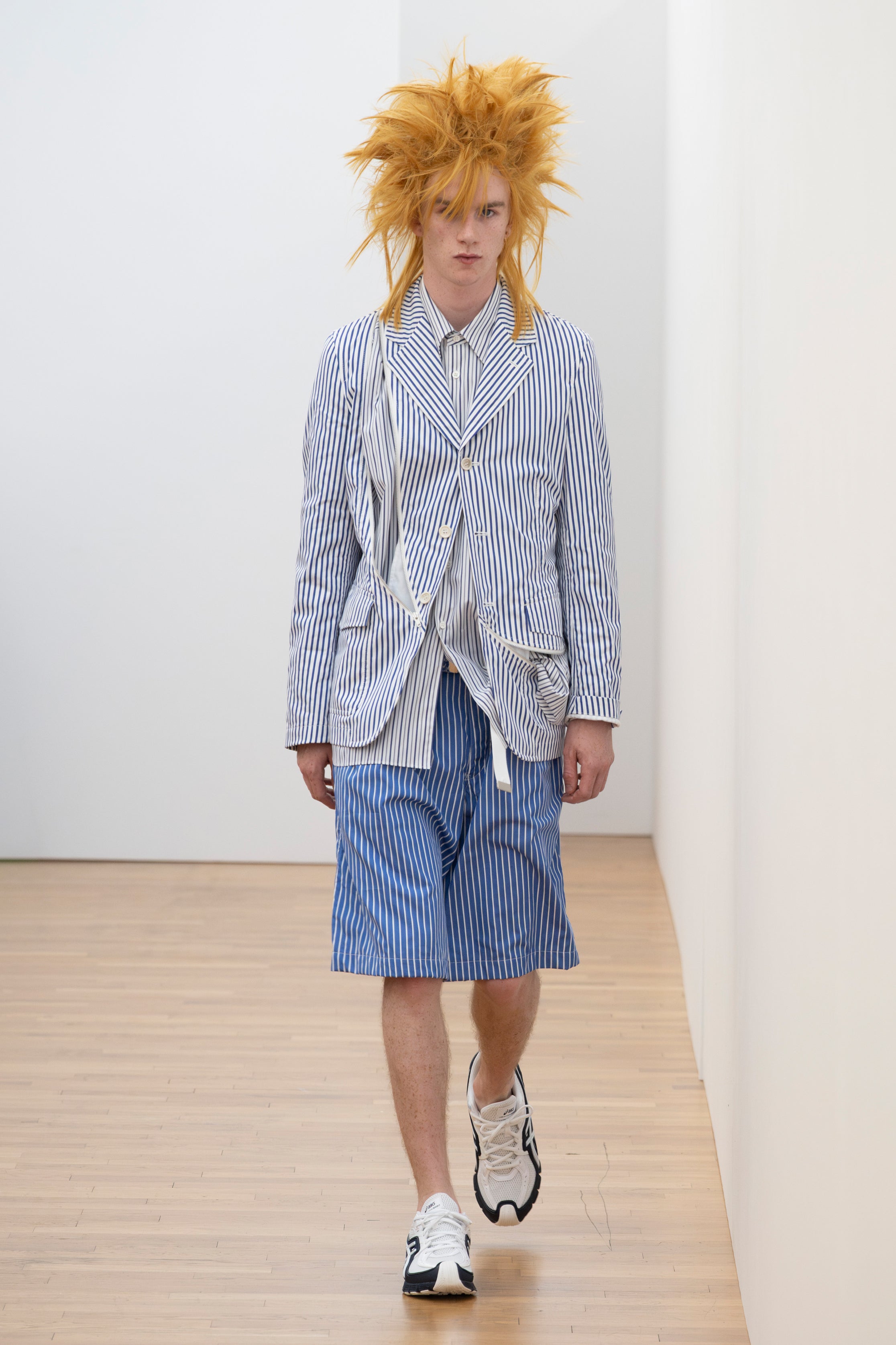 Fashion model wearing a Comme des Garçons Shirt SS26 outfit