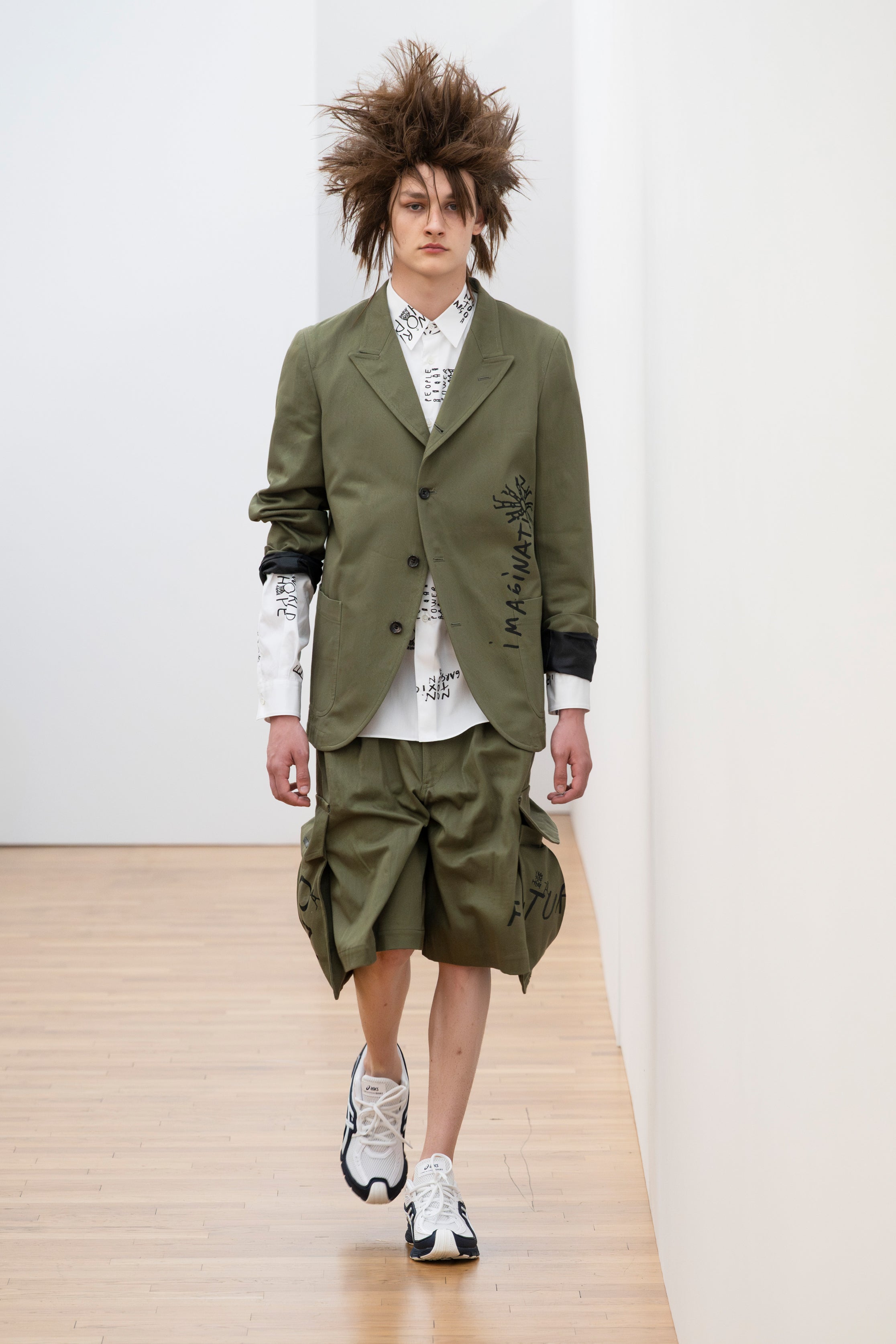 Fashion model wearing a Comme des Garçons Shirt SS26 outfit