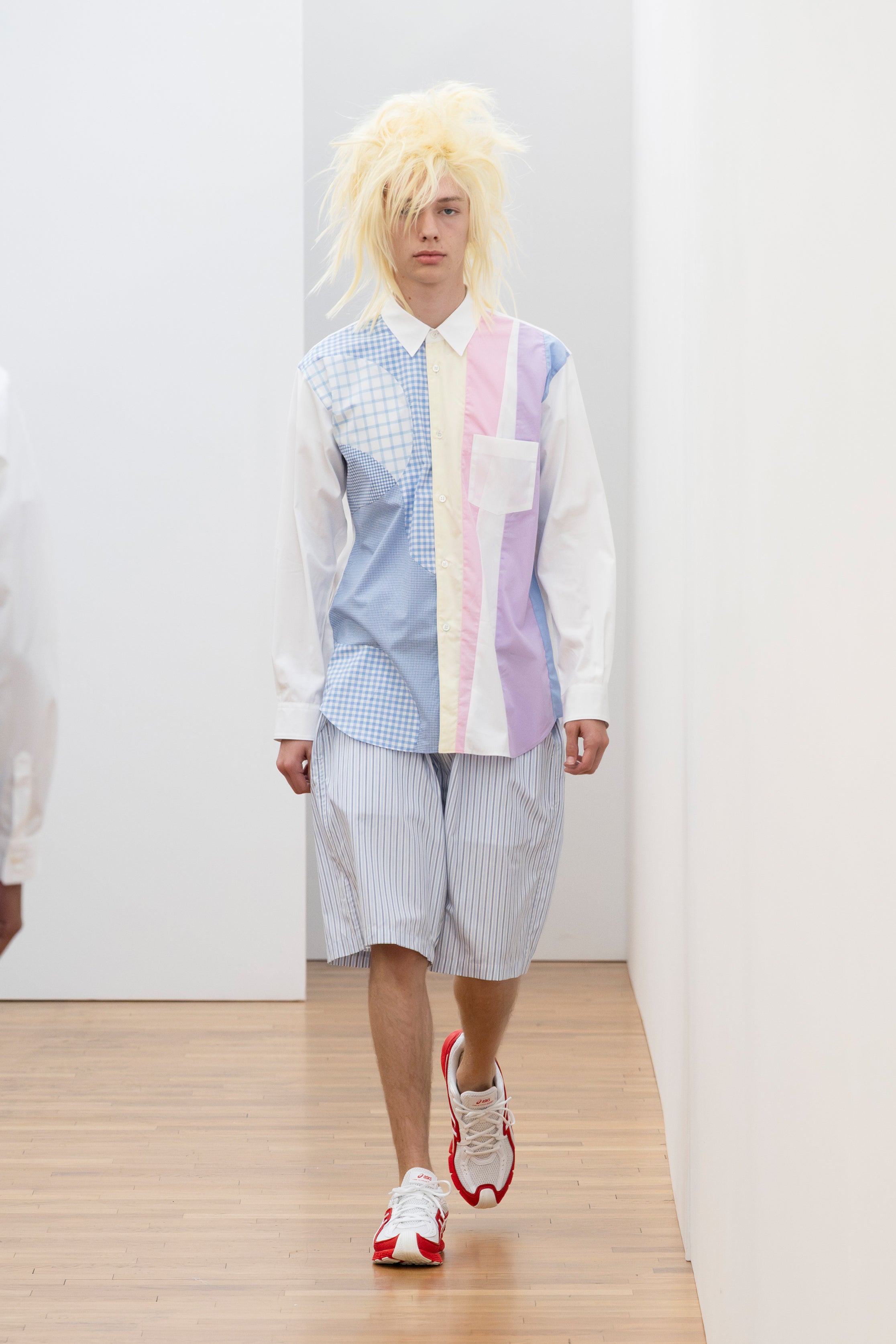 Fashion model wearing a Comme des Garçons Shirt SS26 outfit