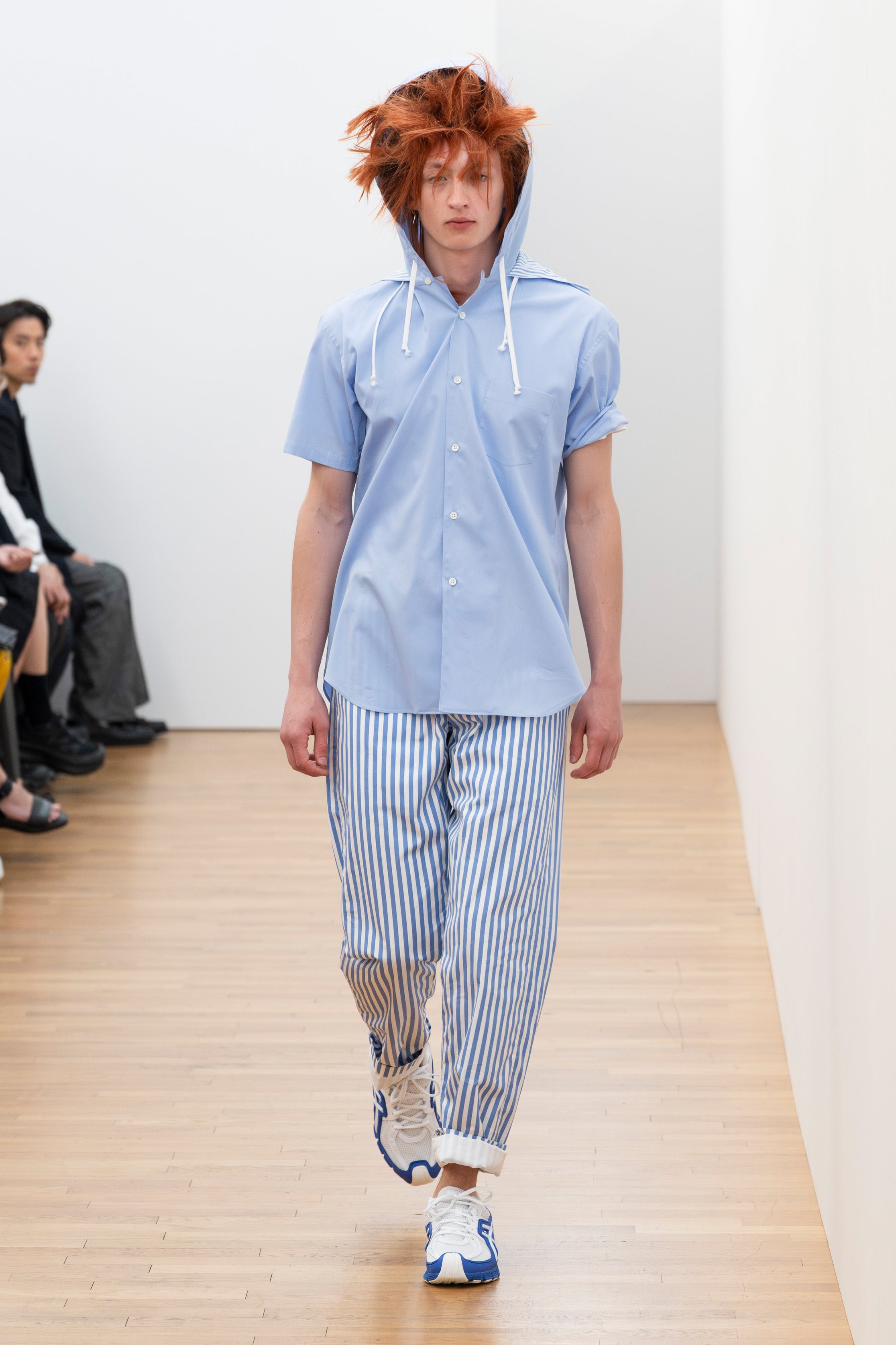 Fashion model wearing a Comme des Garçons Shirt SS26 outfit