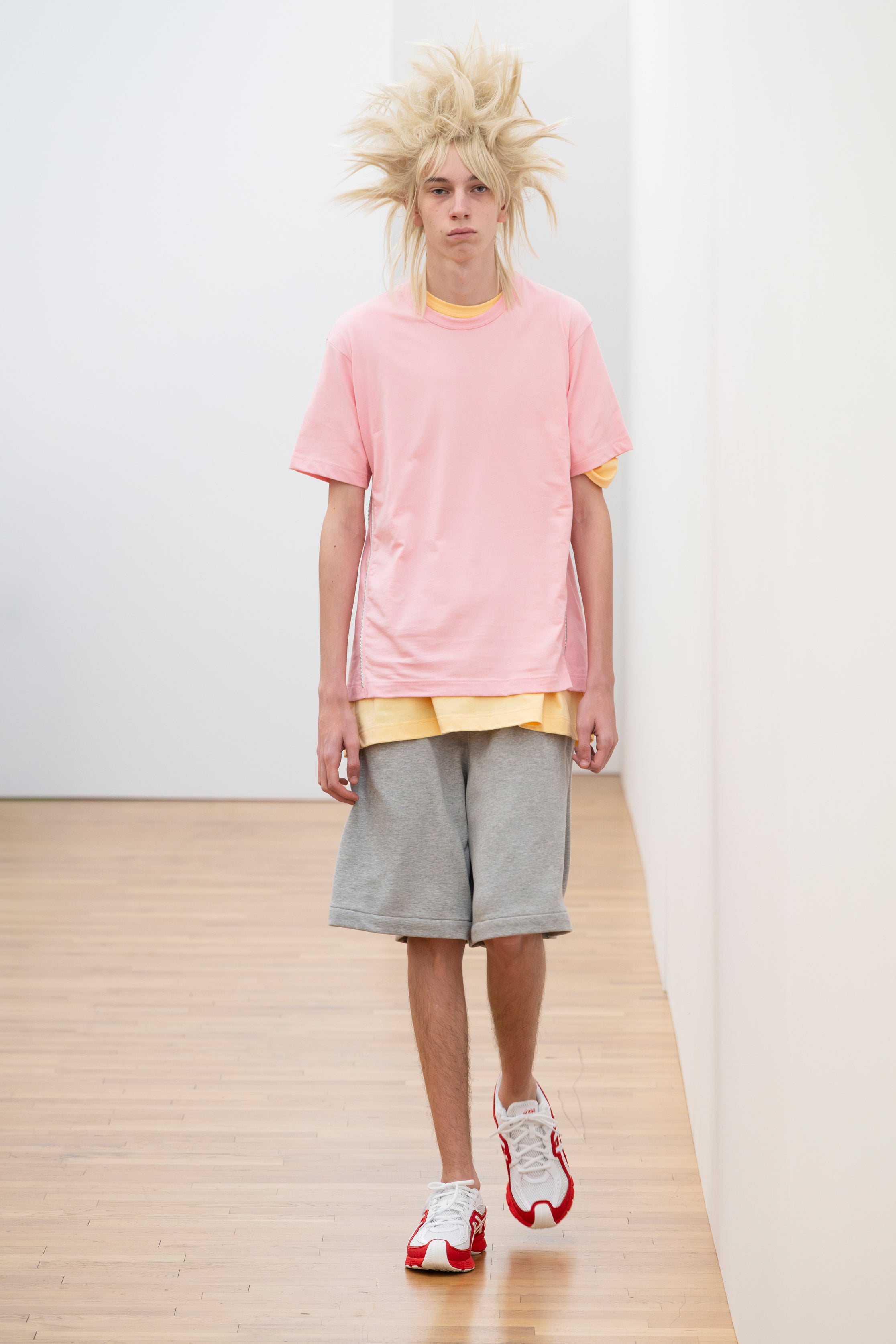 Fashion model wearing a Comme des Garçons Shirt SS26 outfit