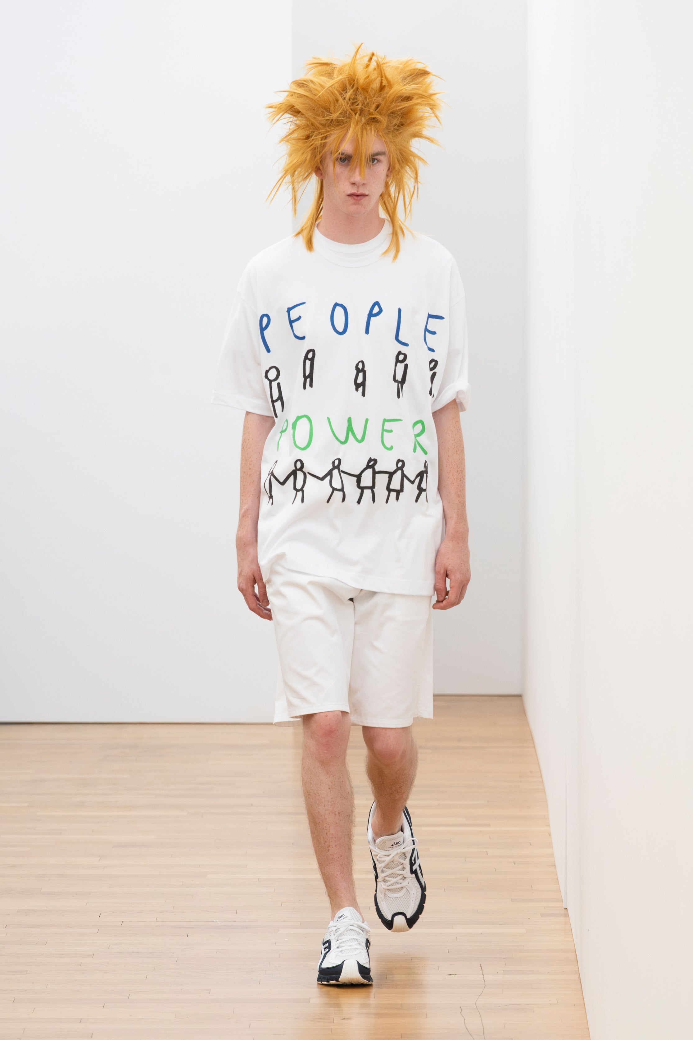 Fashion model wearing a Comme des Garçons Shirt SS26 outfit