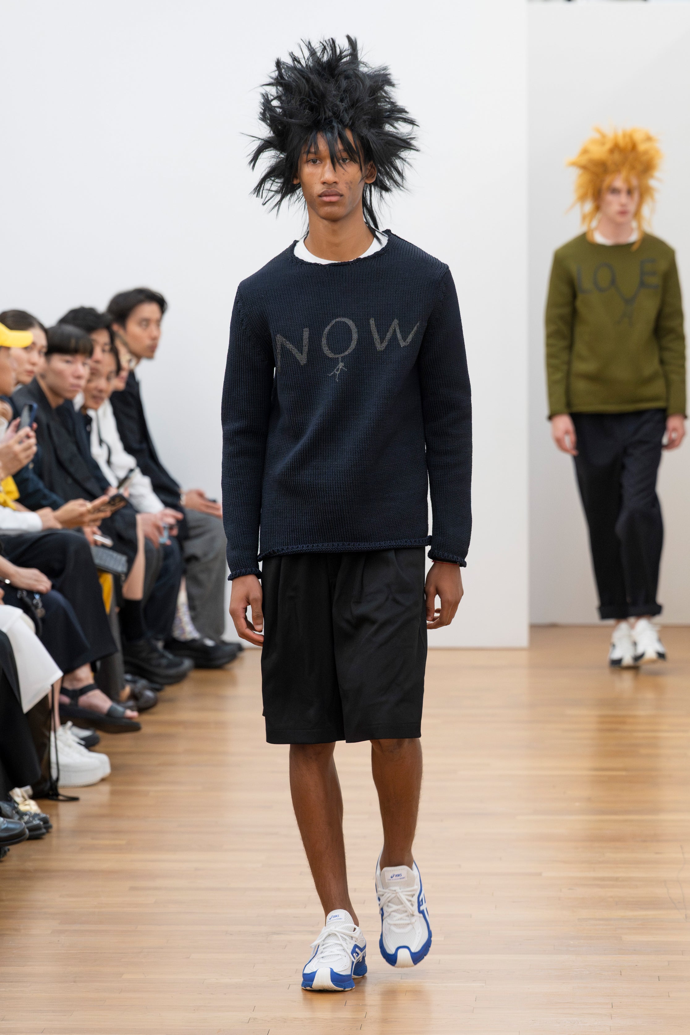 Fashion model wearing a Comme des Garçons Shirt SS26 outfit