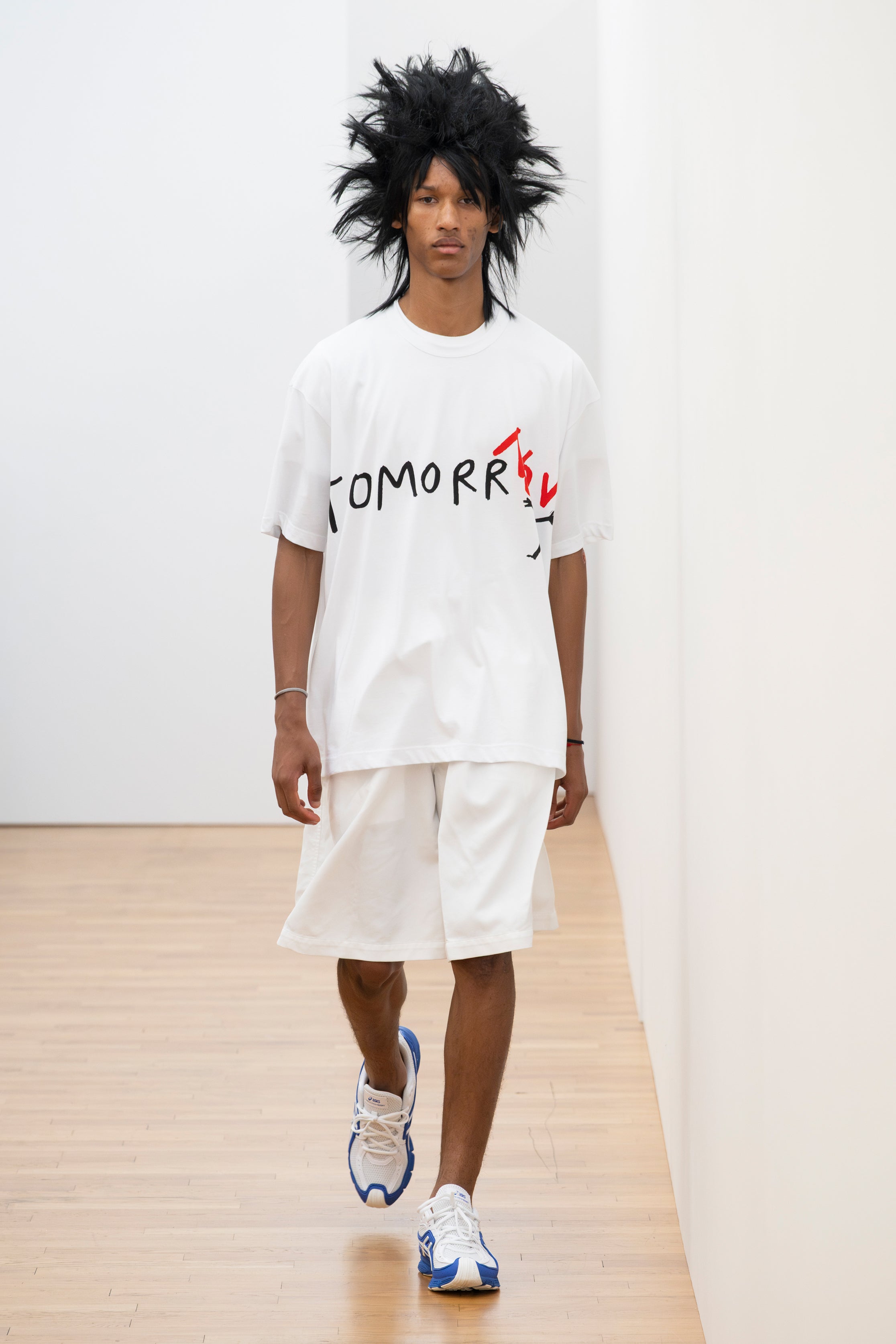 Fashion model wearing a Comme des Garçons Shirt SS26 outfit