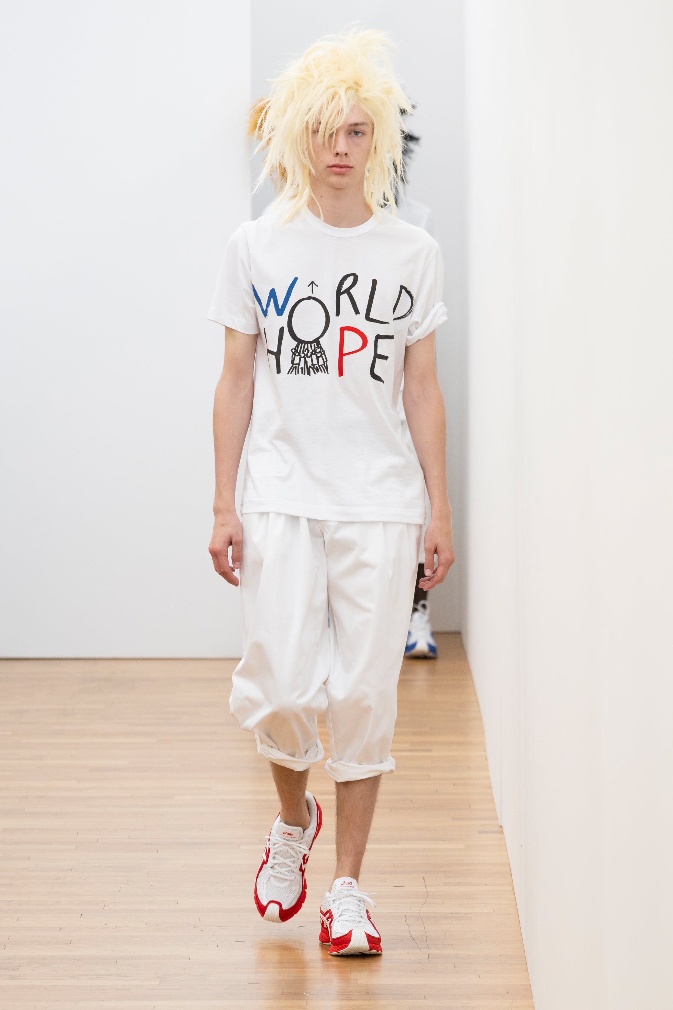 Fashion model wearing a Comme des Garçons Shirt SS26 outfit