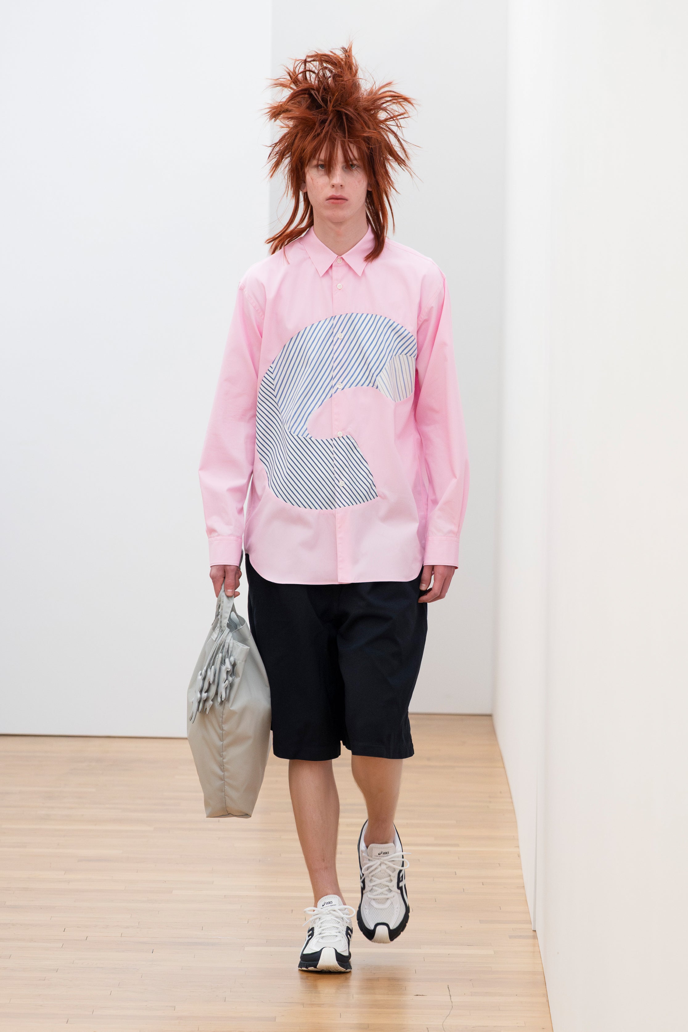 Fashion model wearing a Comme des Garçons Shirt SS26 outfit