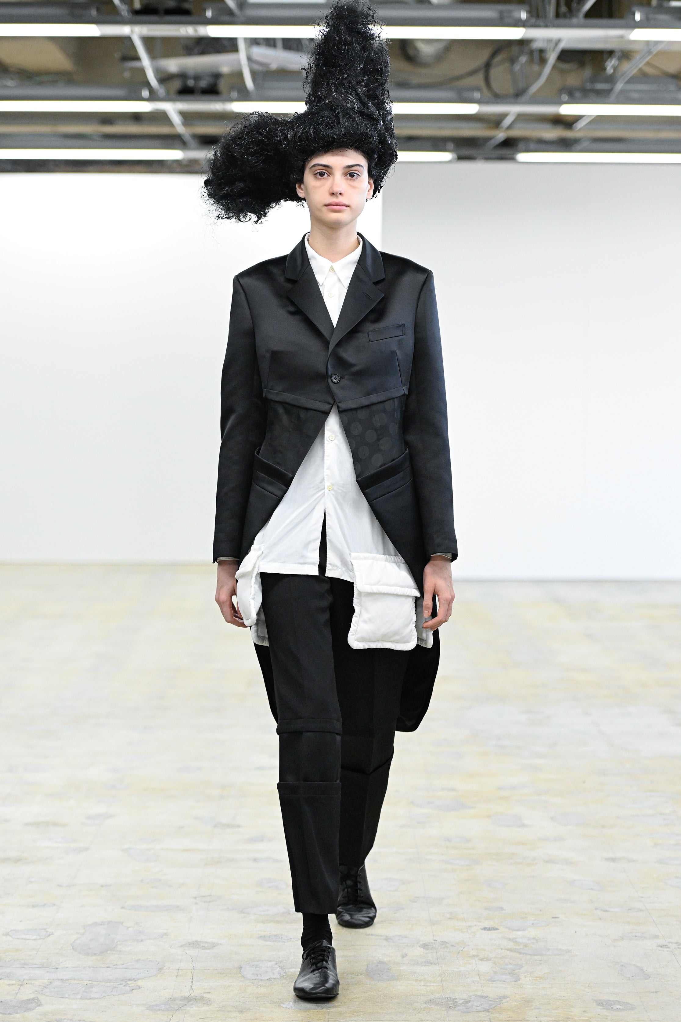 Fashion model wearing a Comme des Garçons Comme des Garçons AW25 outfit